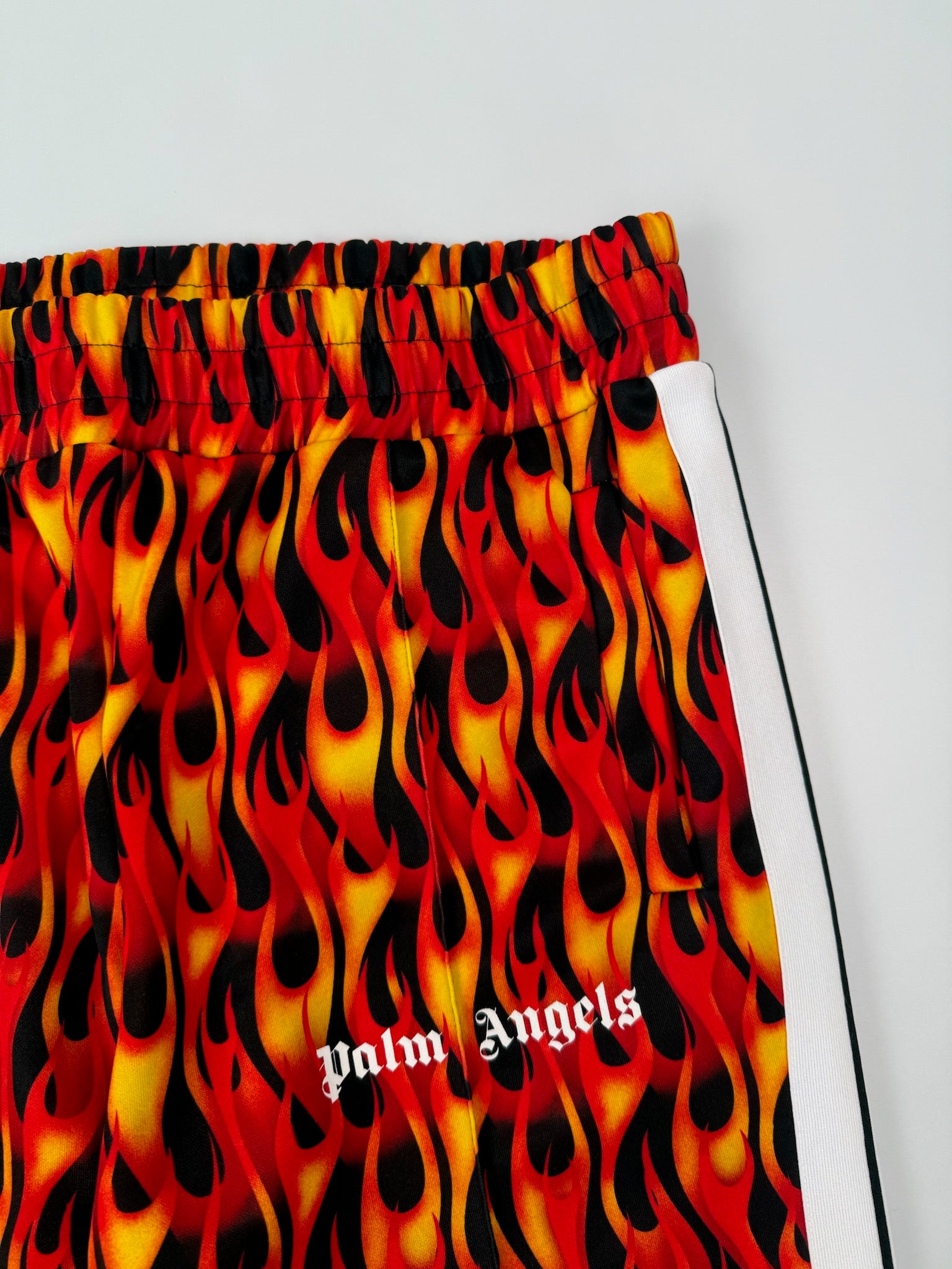 Pants With Flame Print And White Side Stripes