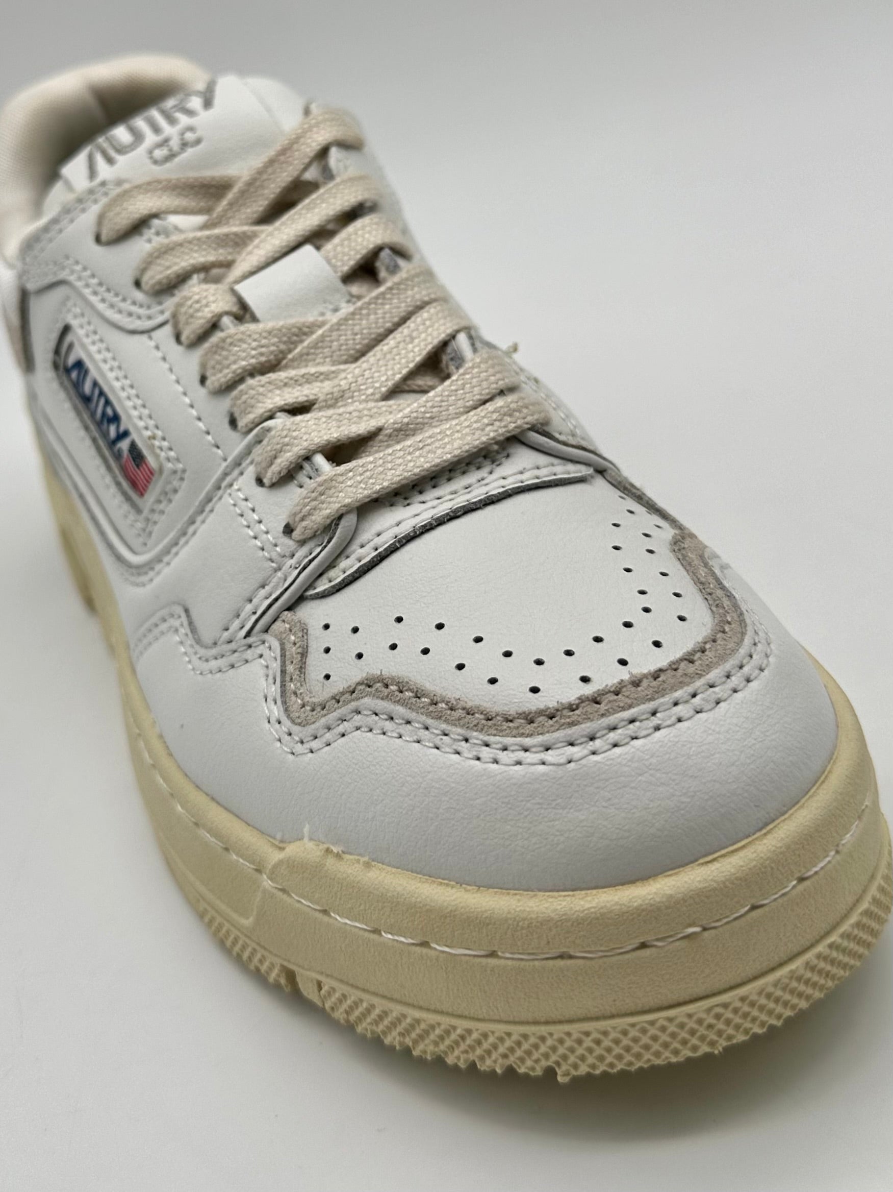 CLC White Low Sneakers