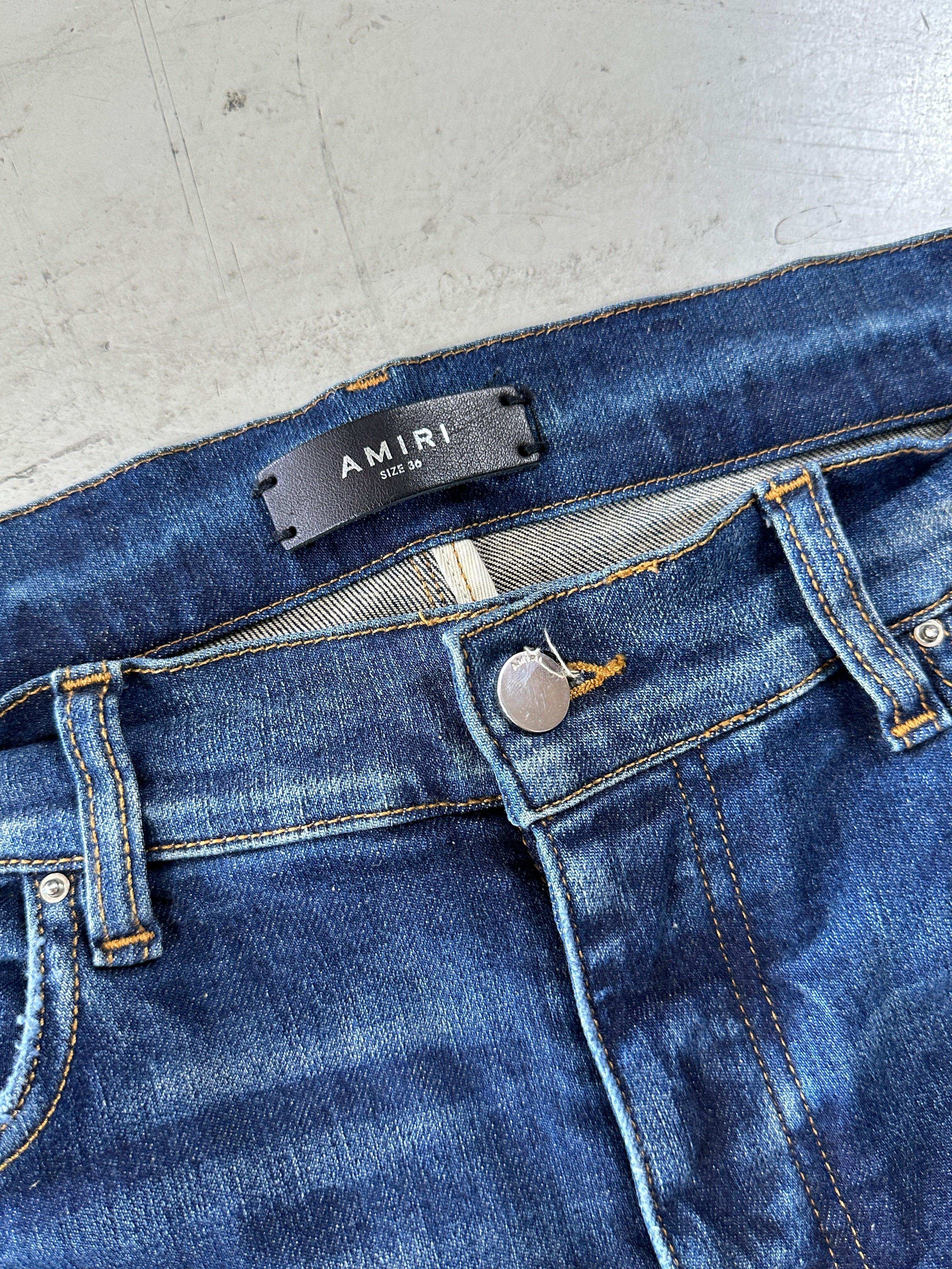 Ripped Slim Jeans
