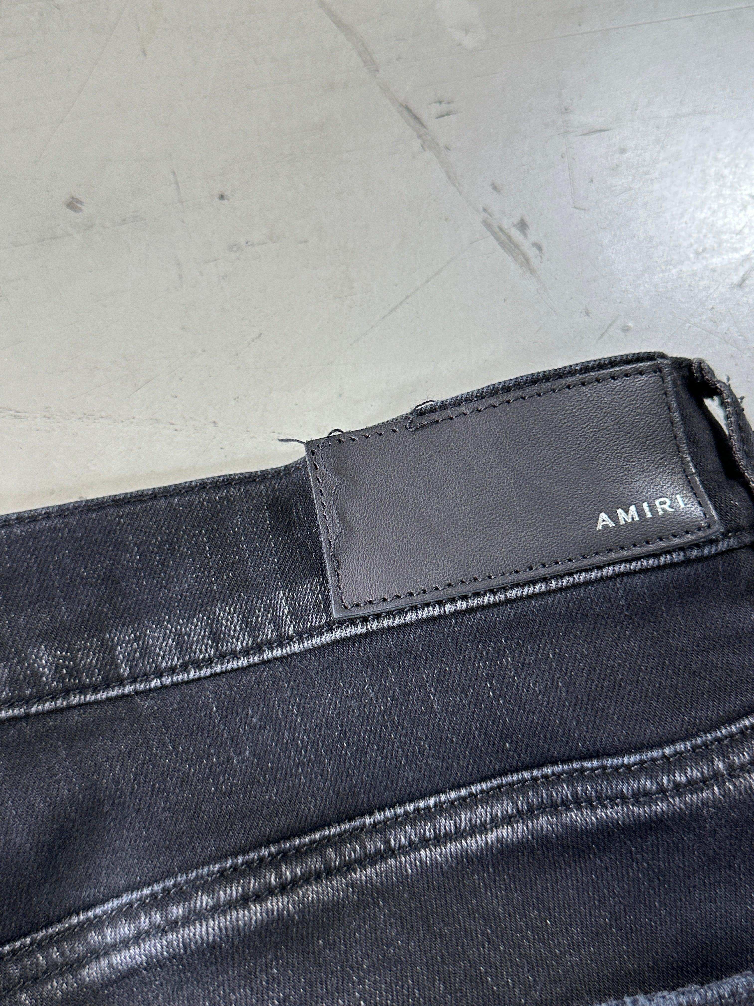 Slim Jeans With Ripped Details