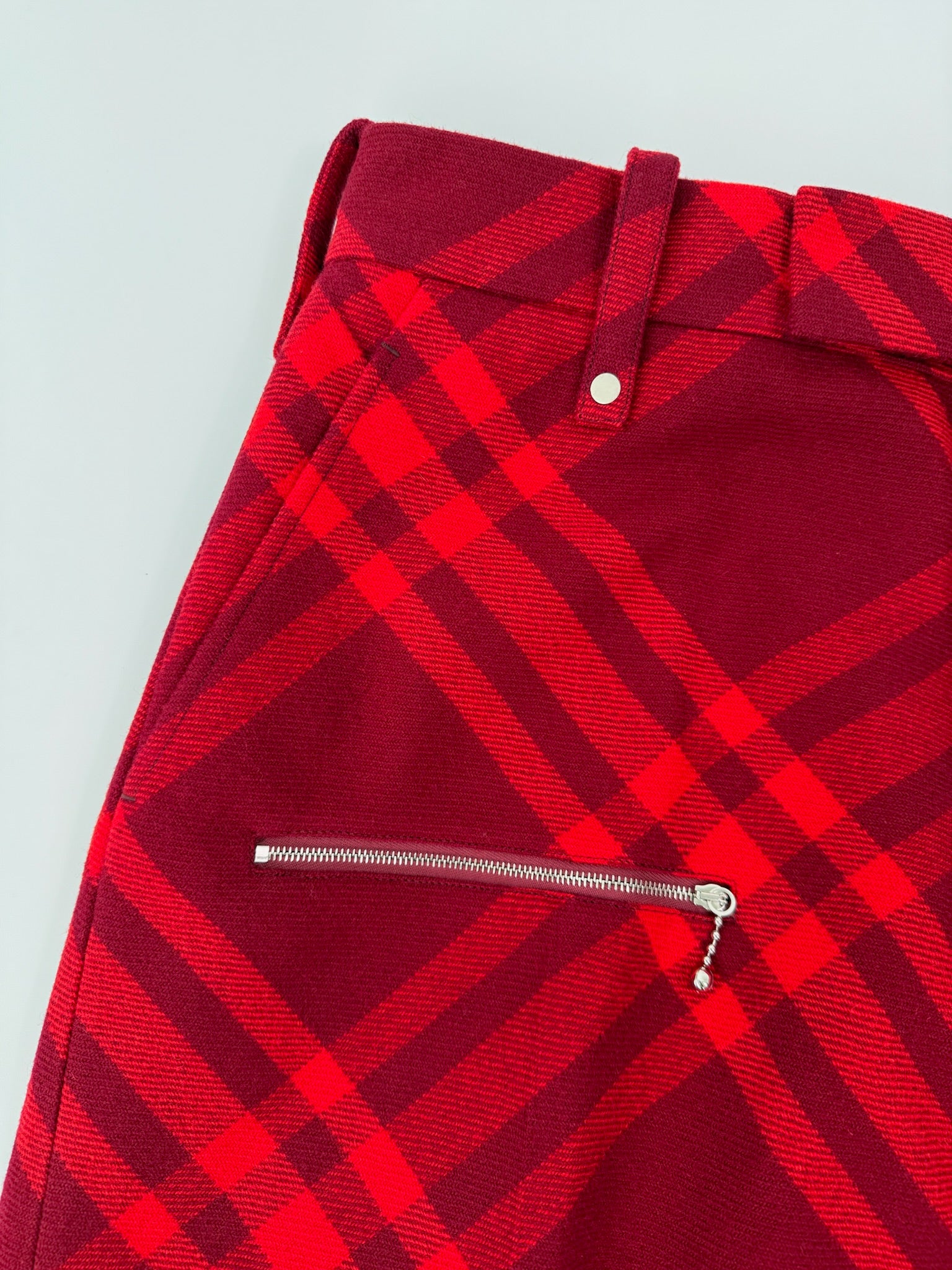 Pantaloni Rossi A Quadri Con Zip