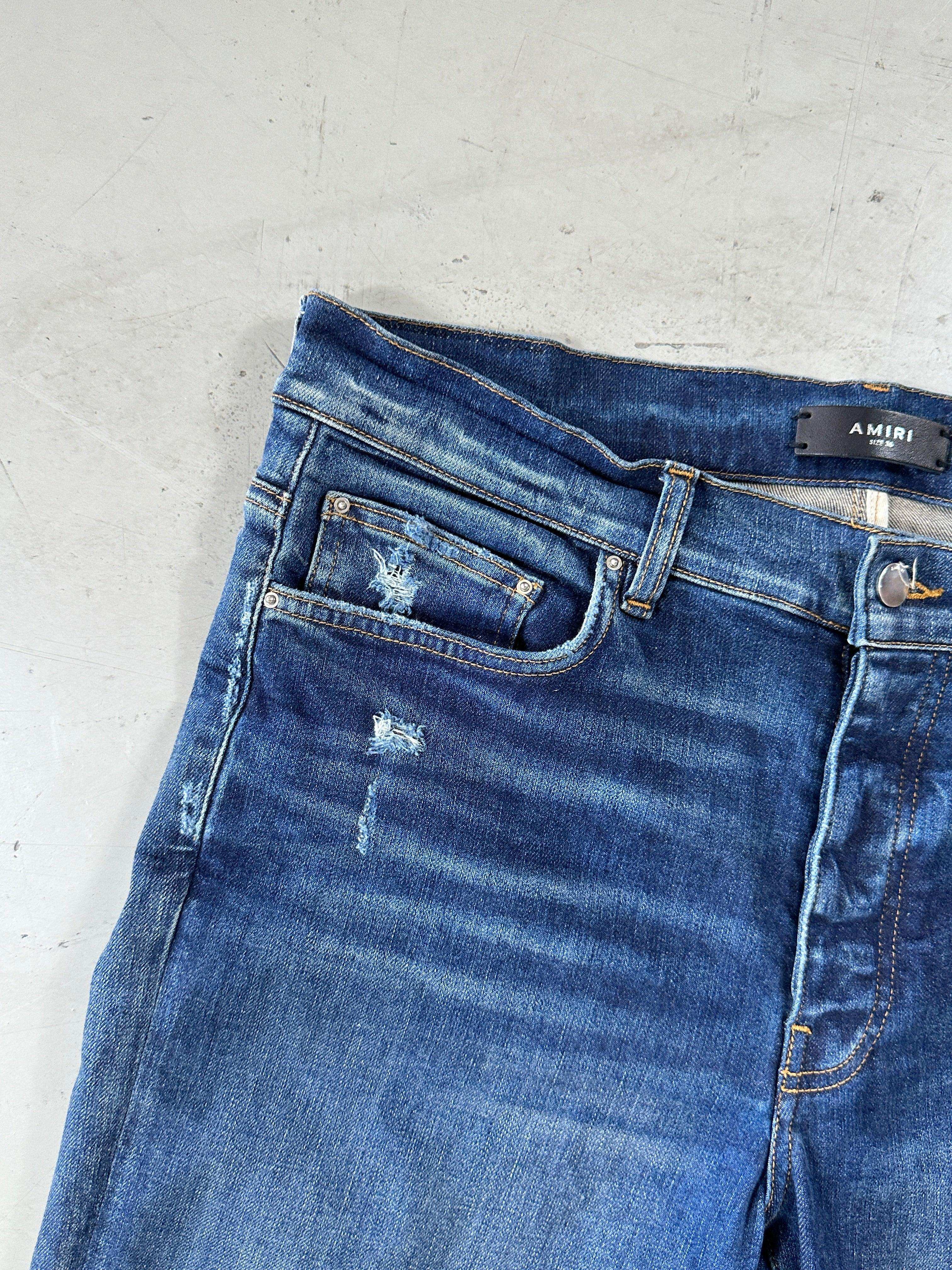 Ripped Slim Jeans