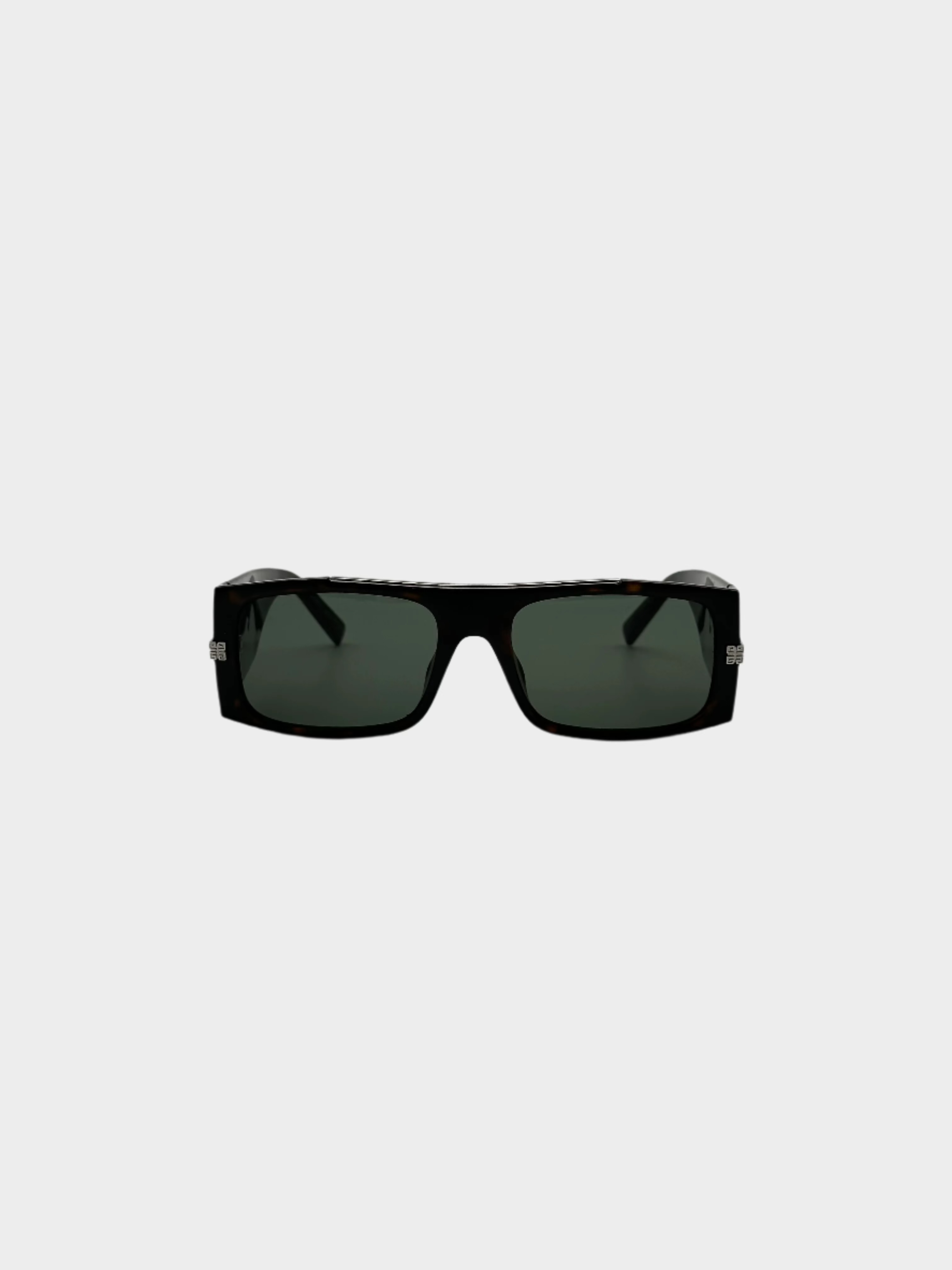 Scopri gli occhiali da sole Givenchy Dark Havana con montatura rettangolare, aste bold e dettagli in metallo con logo. Stile sofisticato. Acquista ora su Qlhype