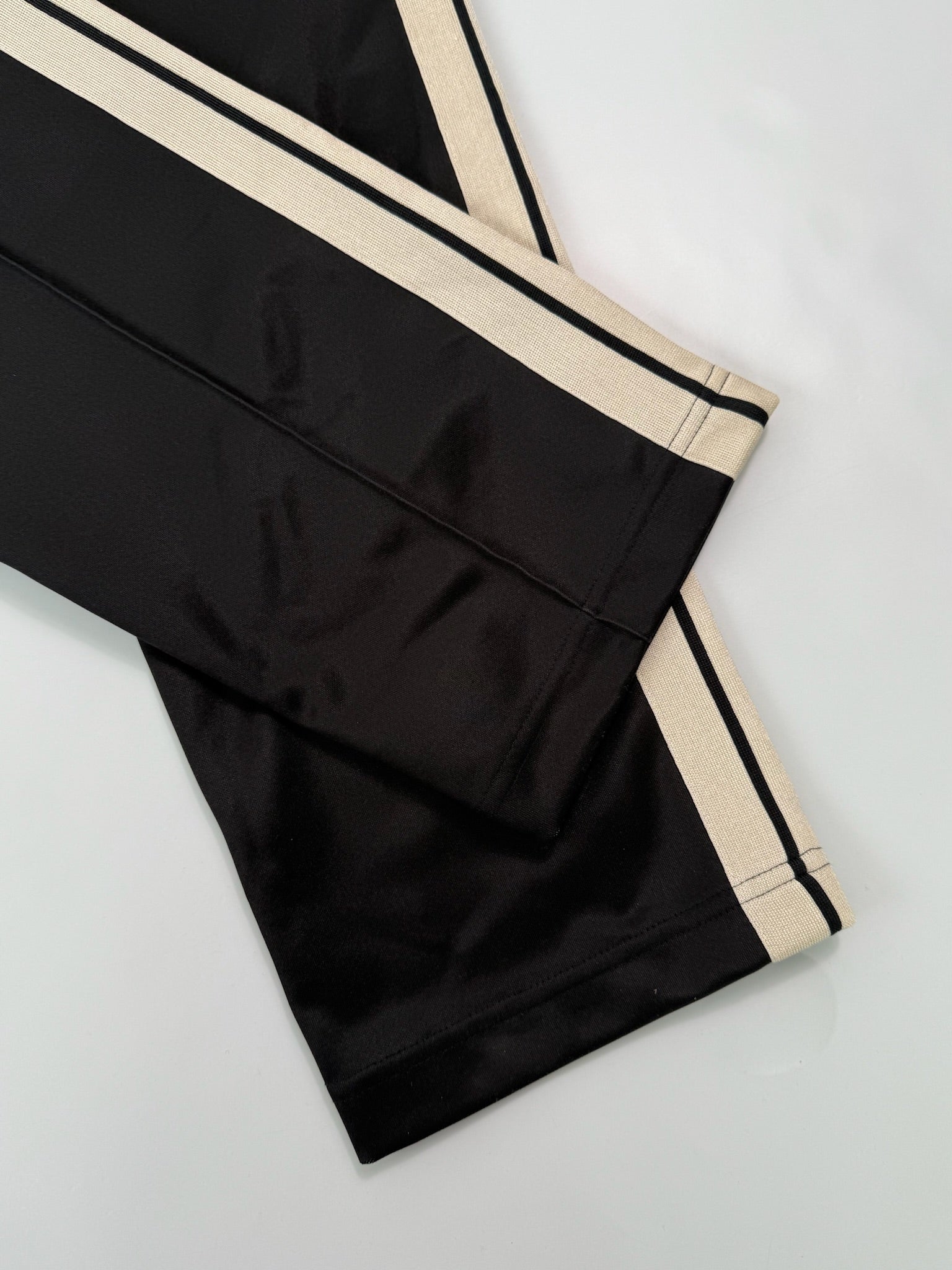 Pantaloni Tuta Neri Con Banda Laterale Beige