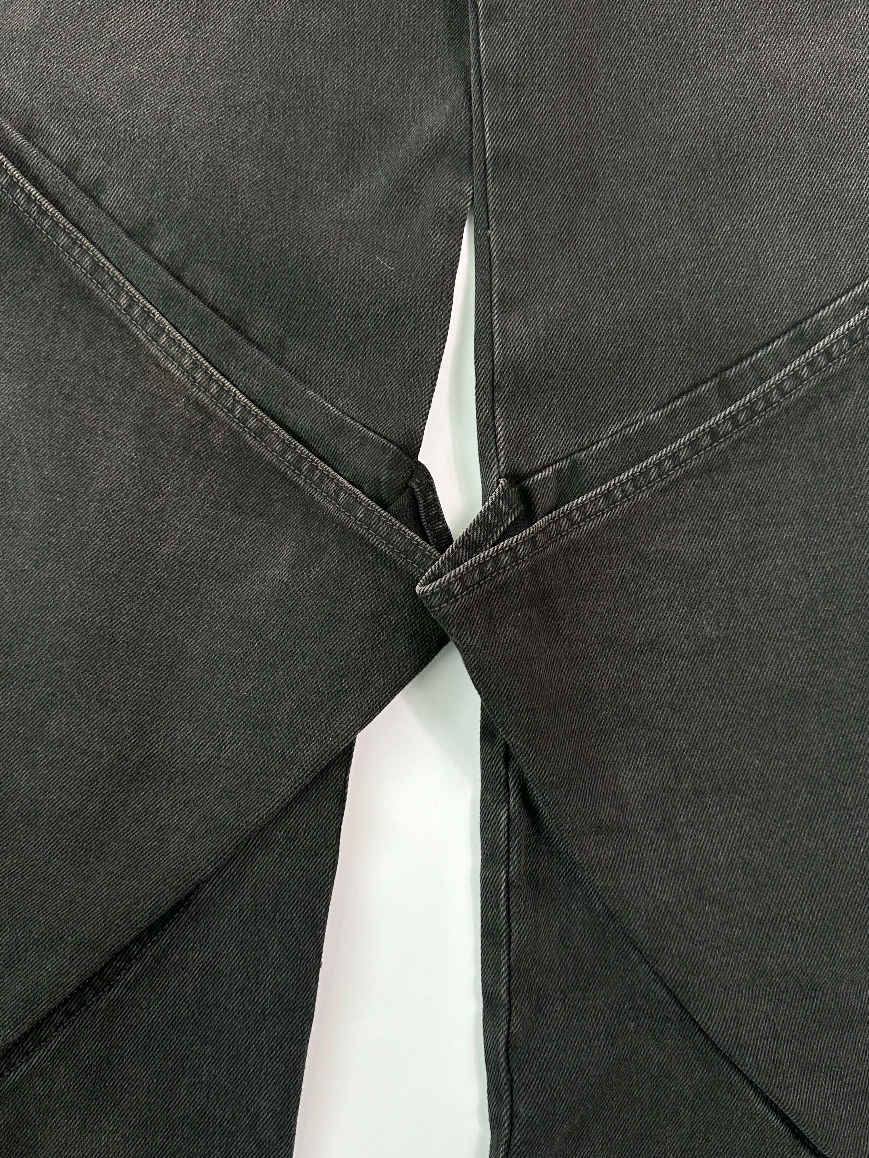 Jeans Neri A Gamba Ampia Con Cuciture Curvilinee