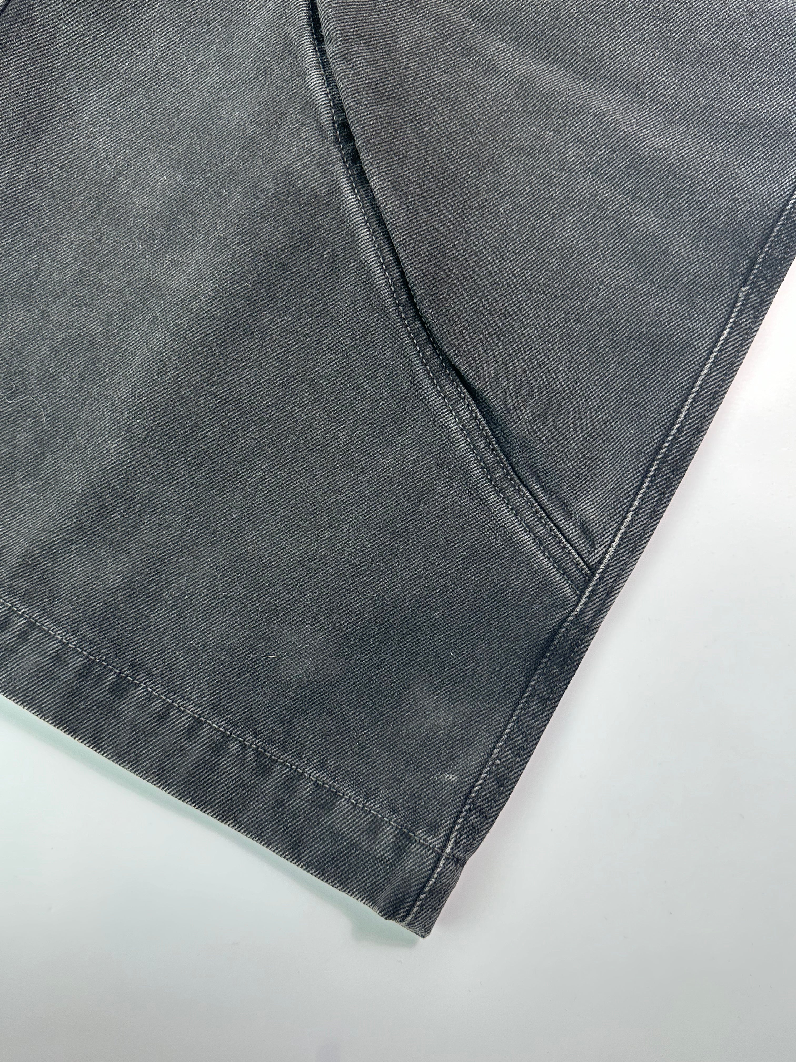 Jeans Neri A Gamba Ampia Con Cuciture Curvilinee