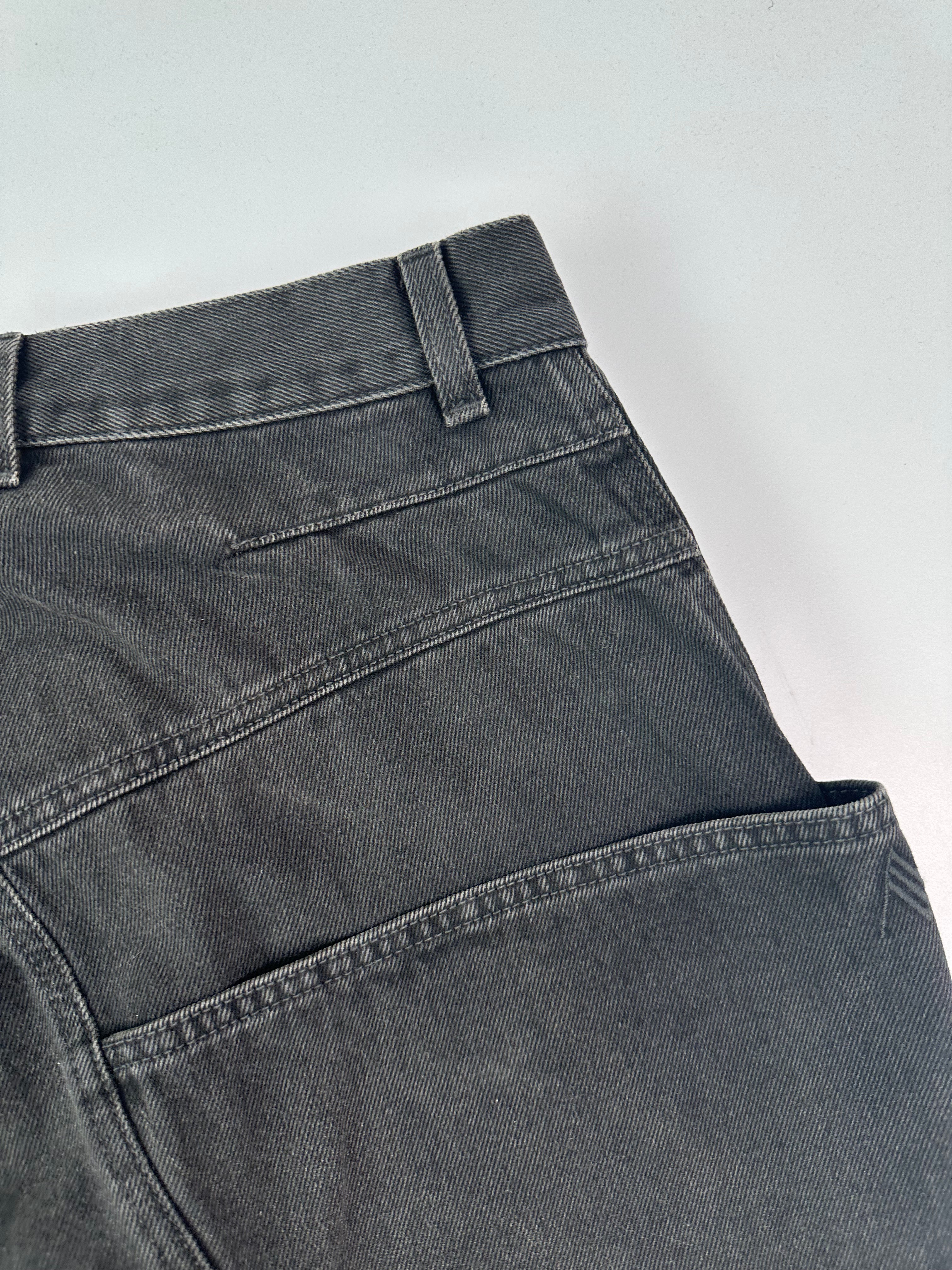 Jeans Neri A Gamba Ampia Con Cuciture Curvilinee