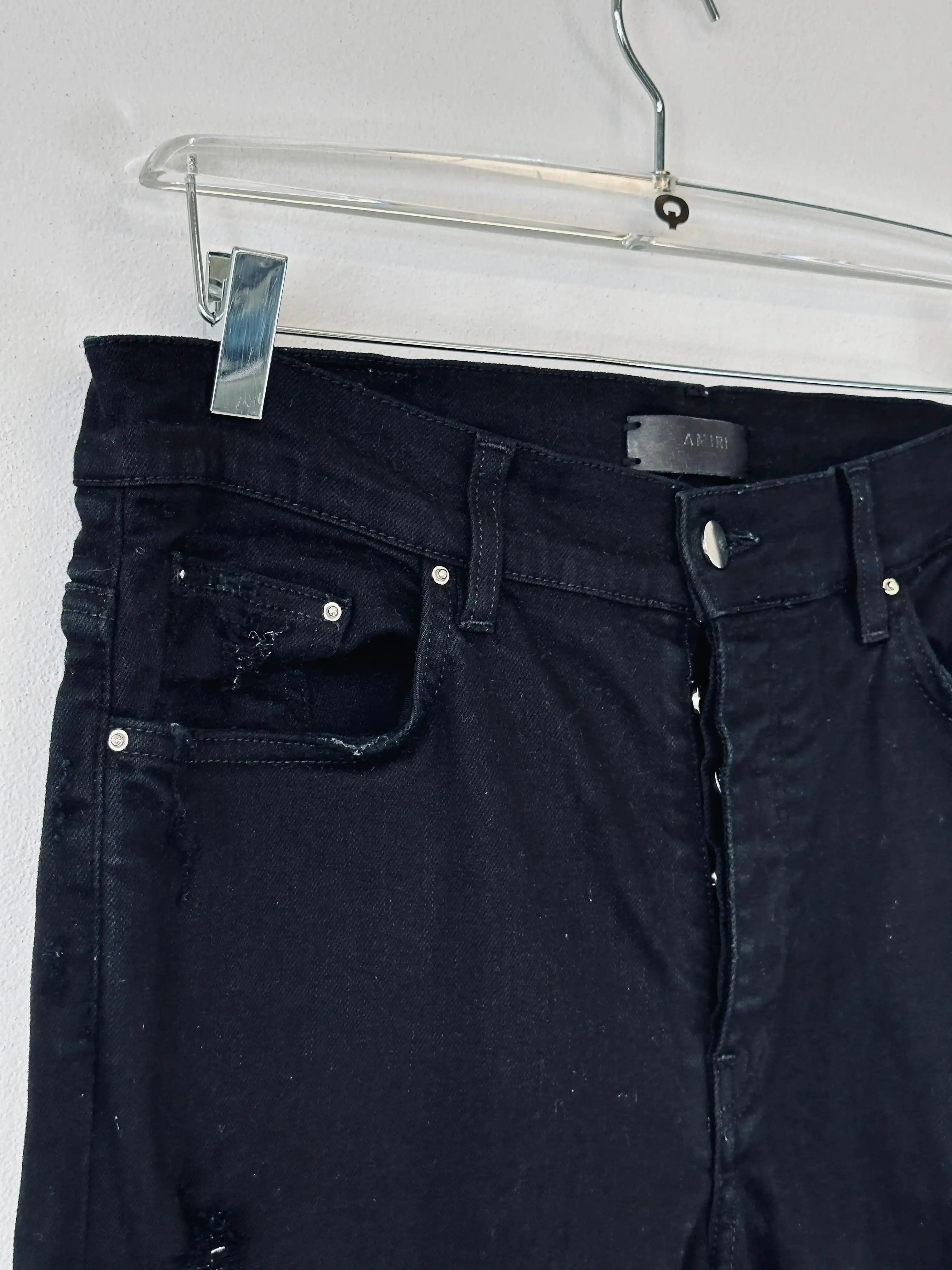 Black Jeans With Rips