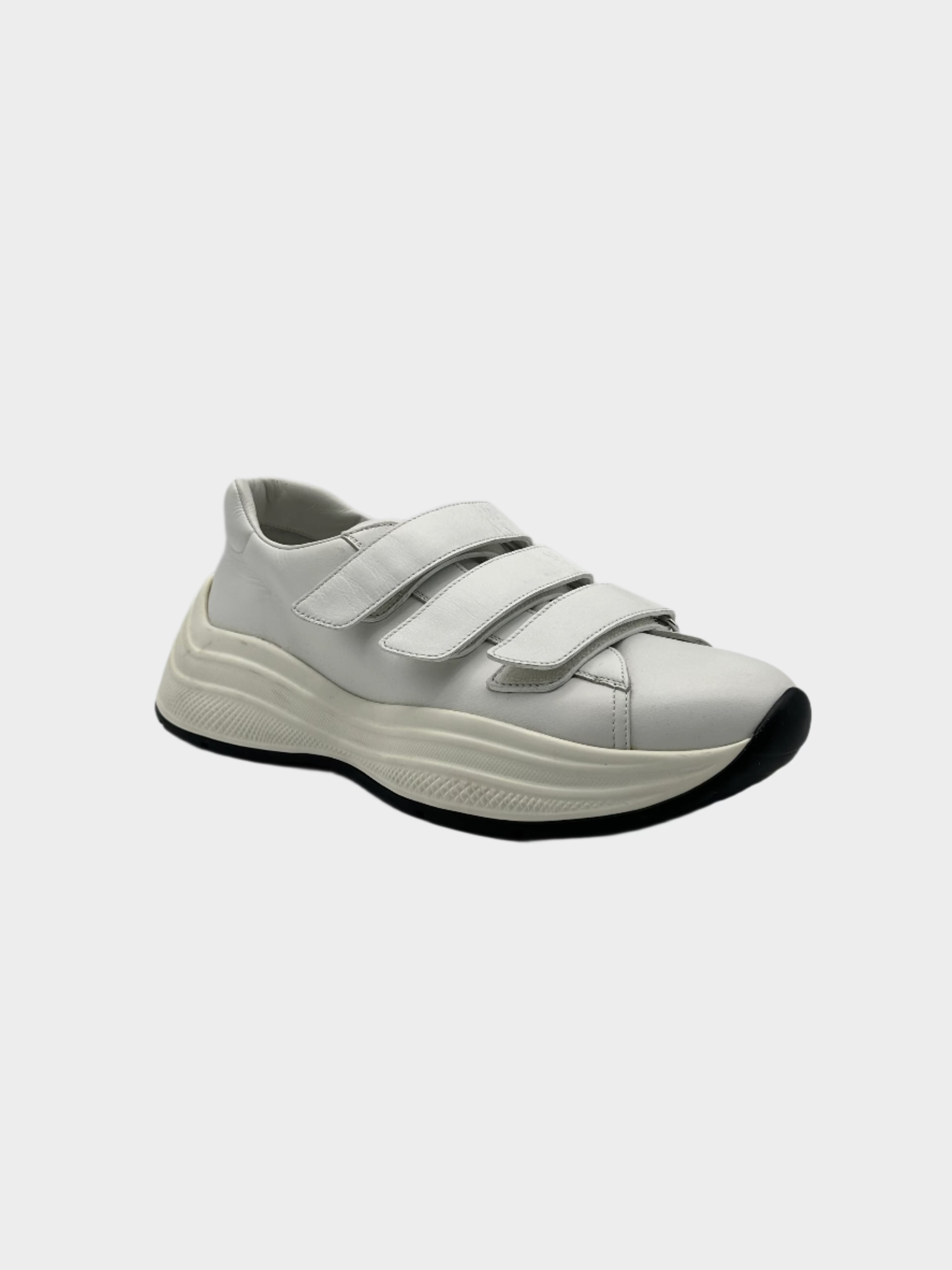 Sneakers Bianche Con Strappi E Logo Sulla Suola