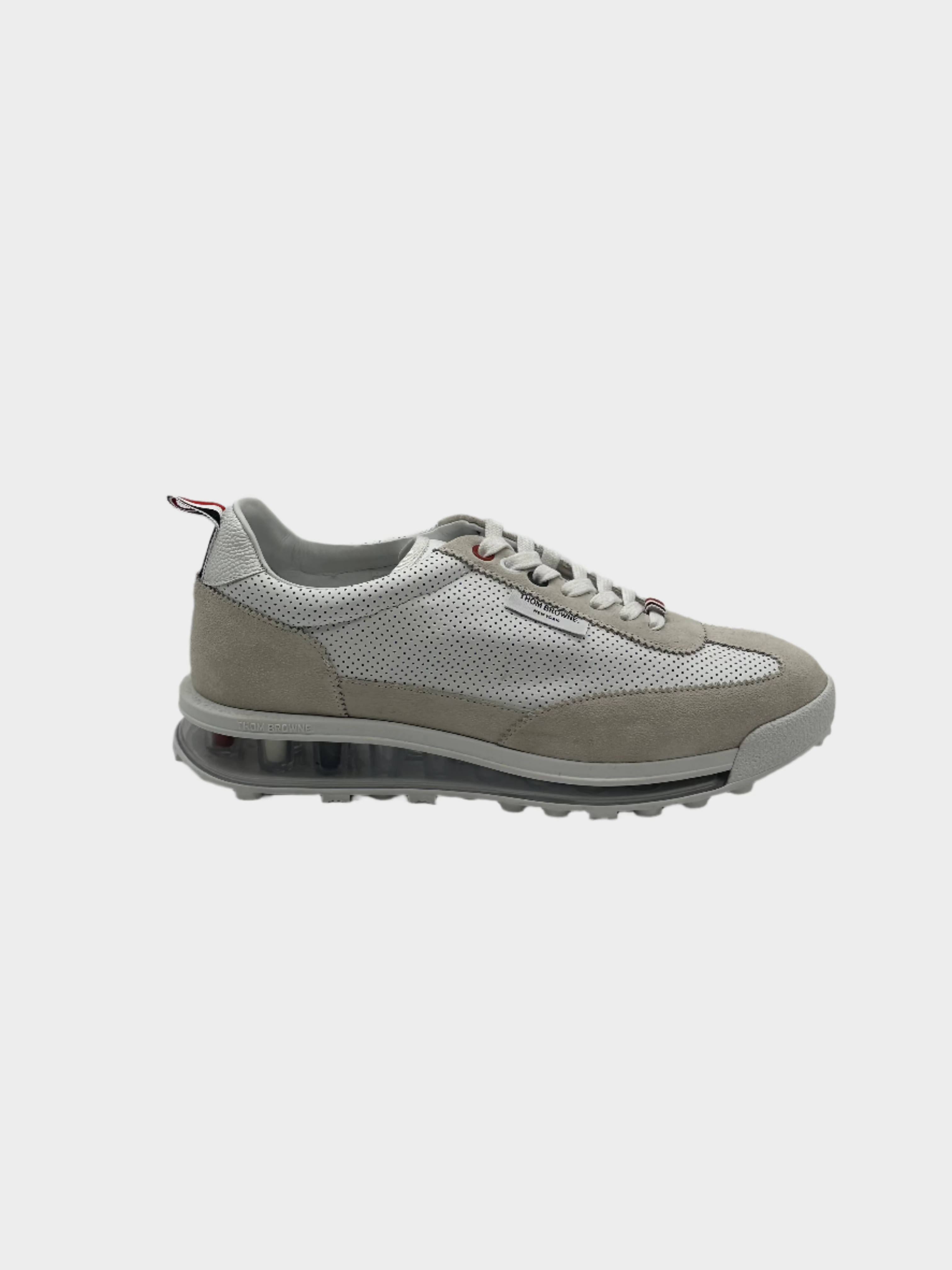 Sneakers Con Suola Trasparente E Dettagli In Pelle Scamosciata
