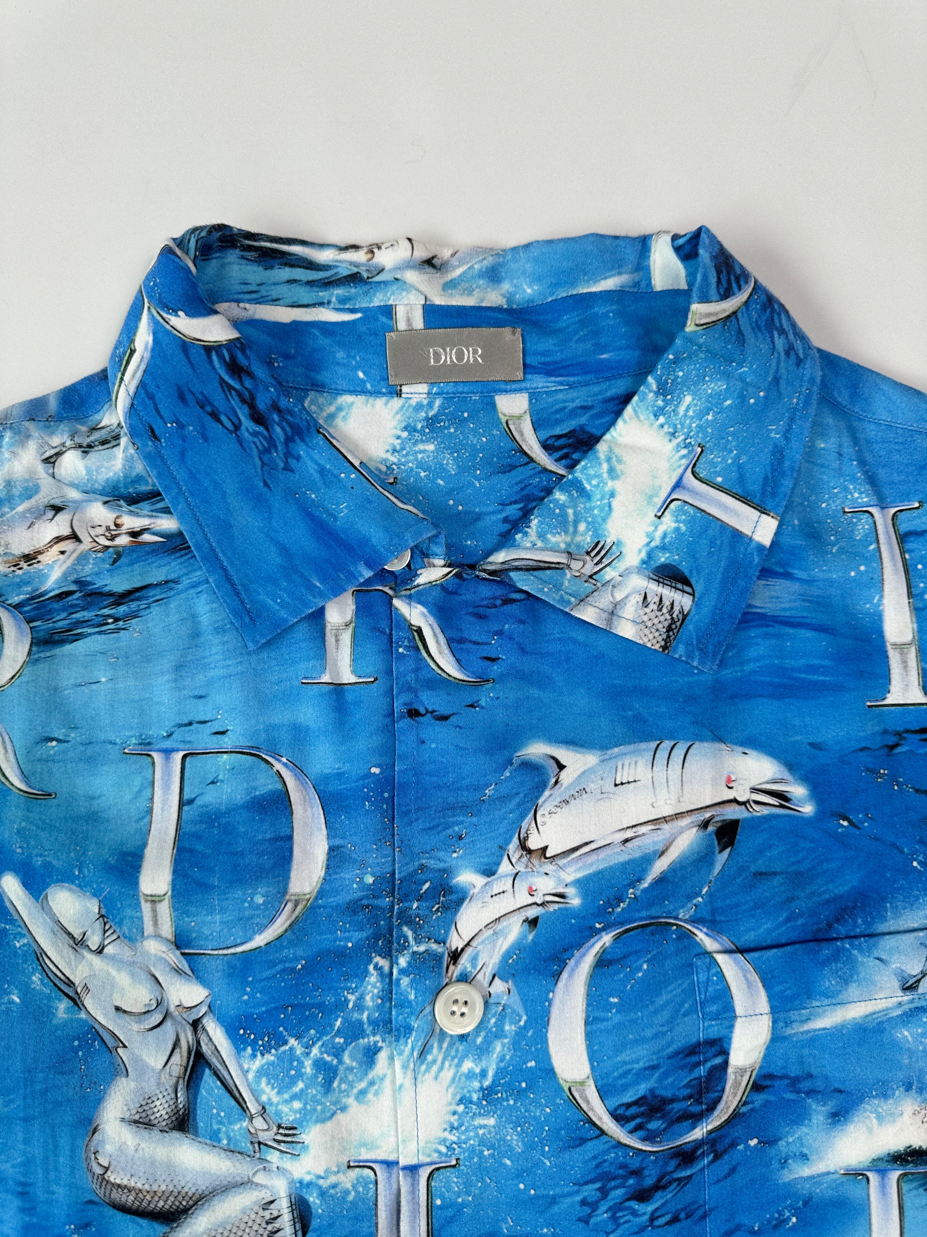 Blue Short Sleeve Shirt With Dolphin Print And All Over Logo