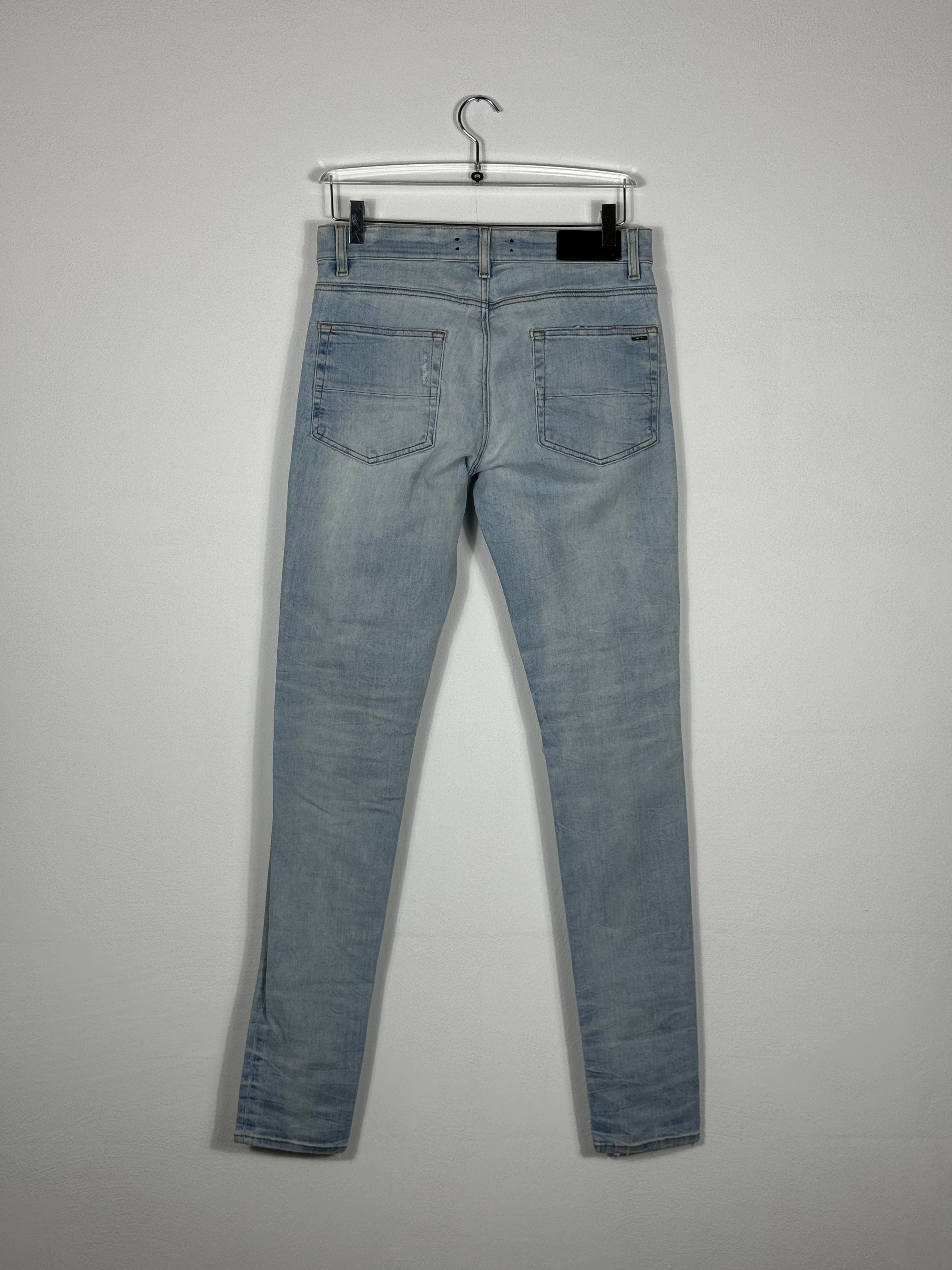 Skinny Jeans With Ripped Details by Sfera Ebbasta
