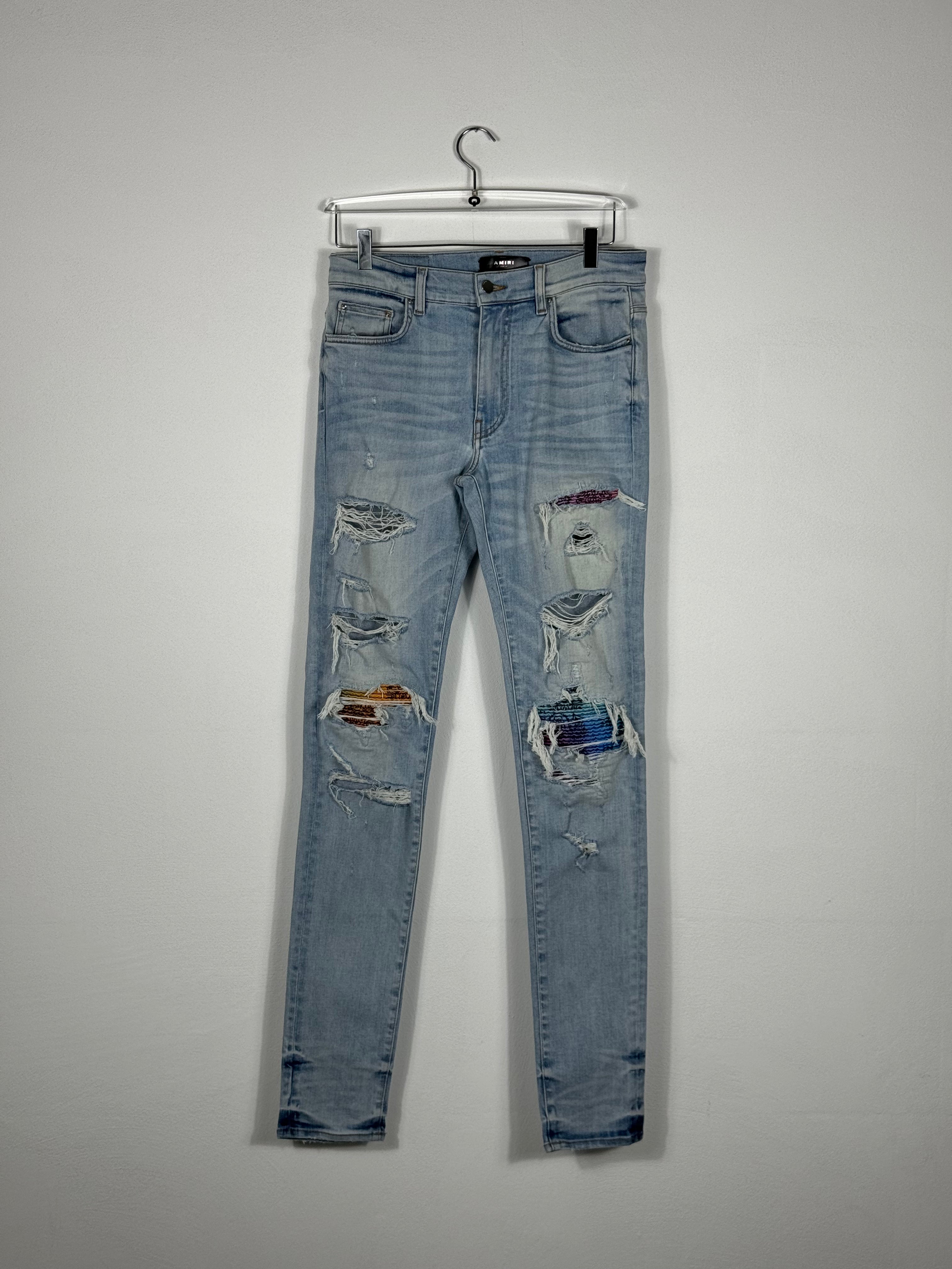 Skinny Jeans With Ripped Details by Sfera Ebbasta