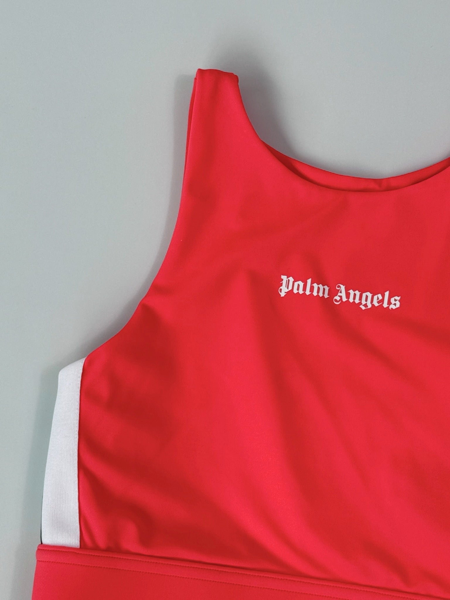 Top Sportivo Fucsia Con Logo Bianco