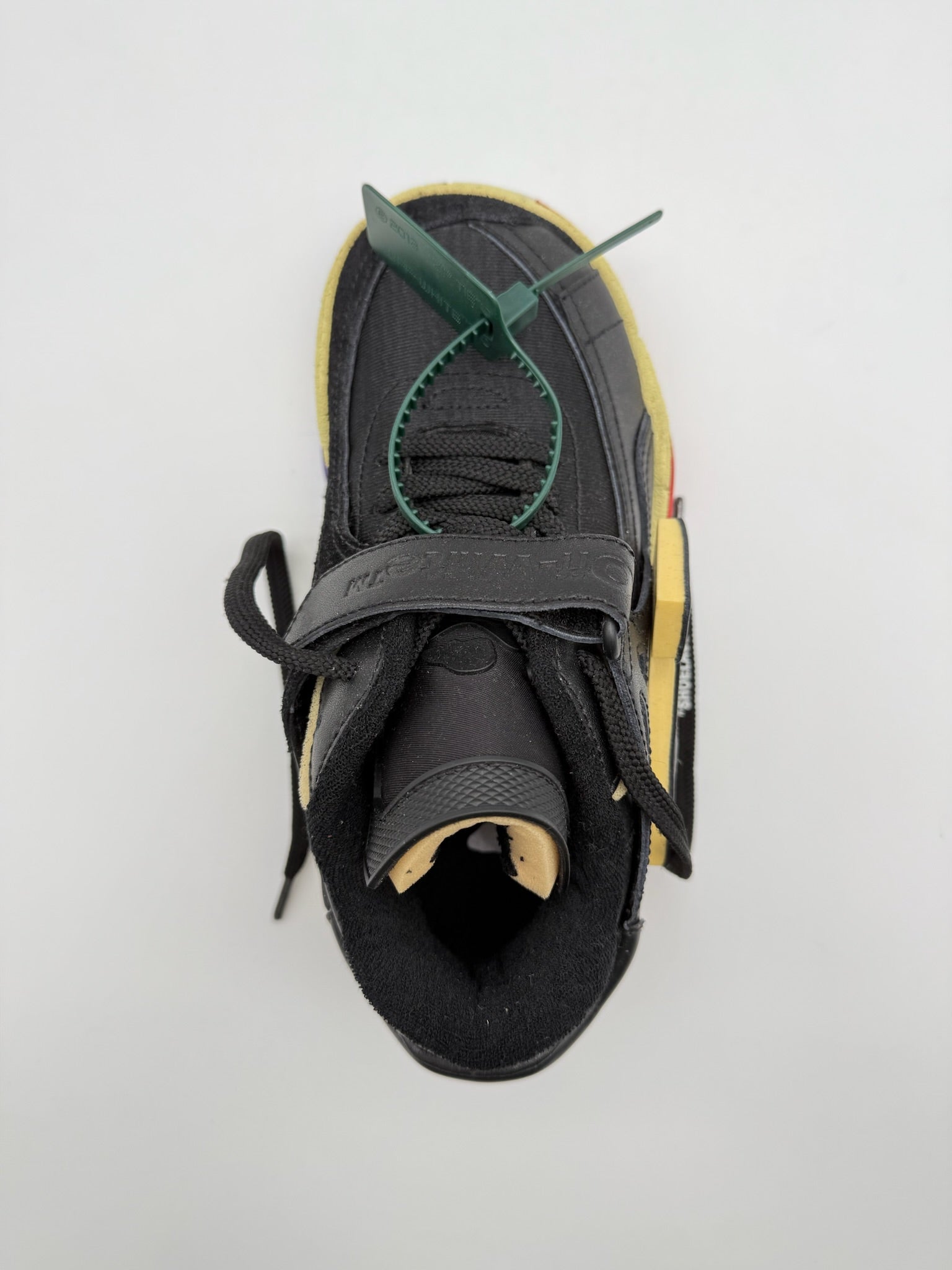 Black Low Top Puzzle Couture Sneakers
