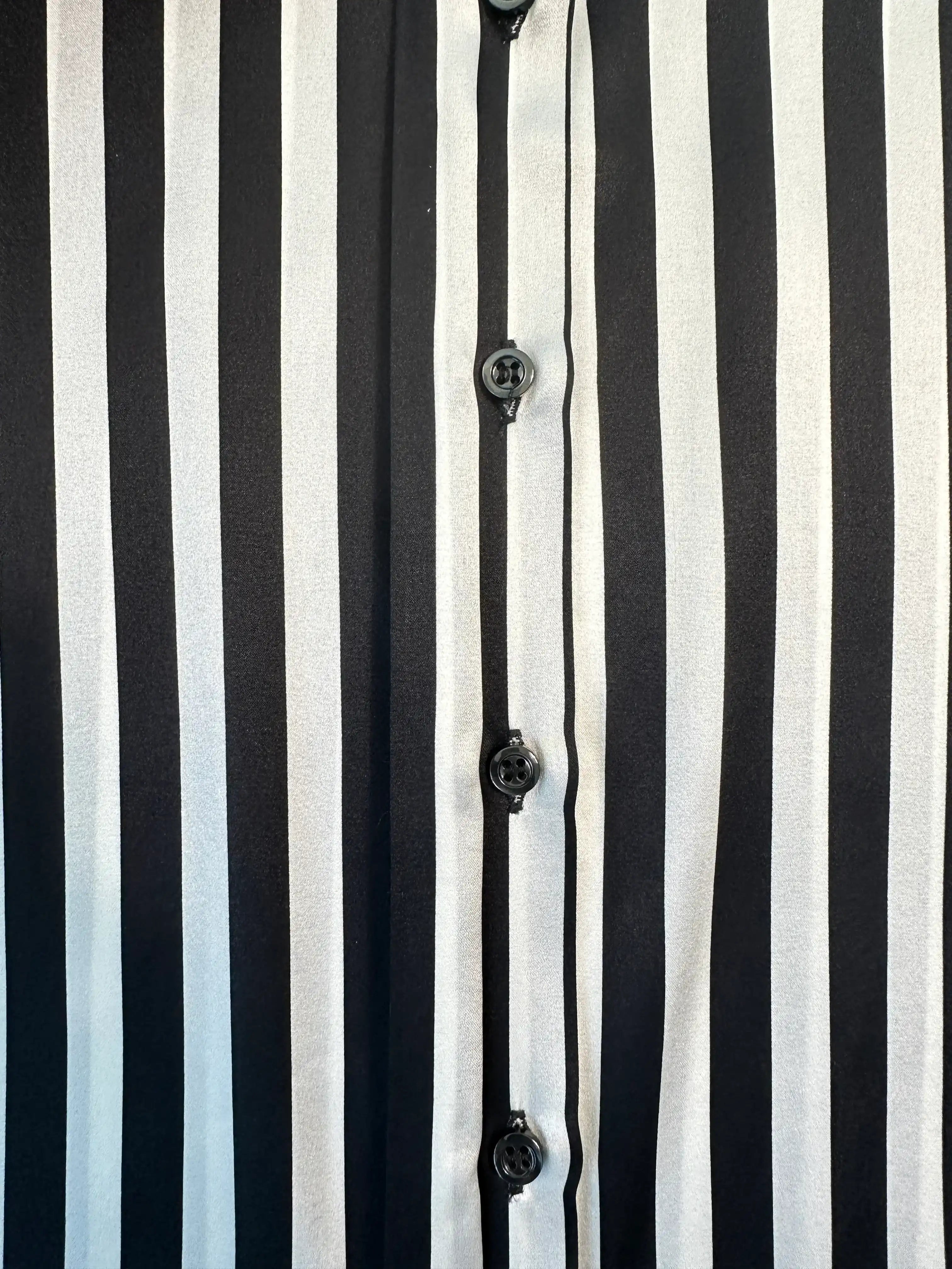 Sleeveless Shirt With Vertical Stripes And Padded Shoulders