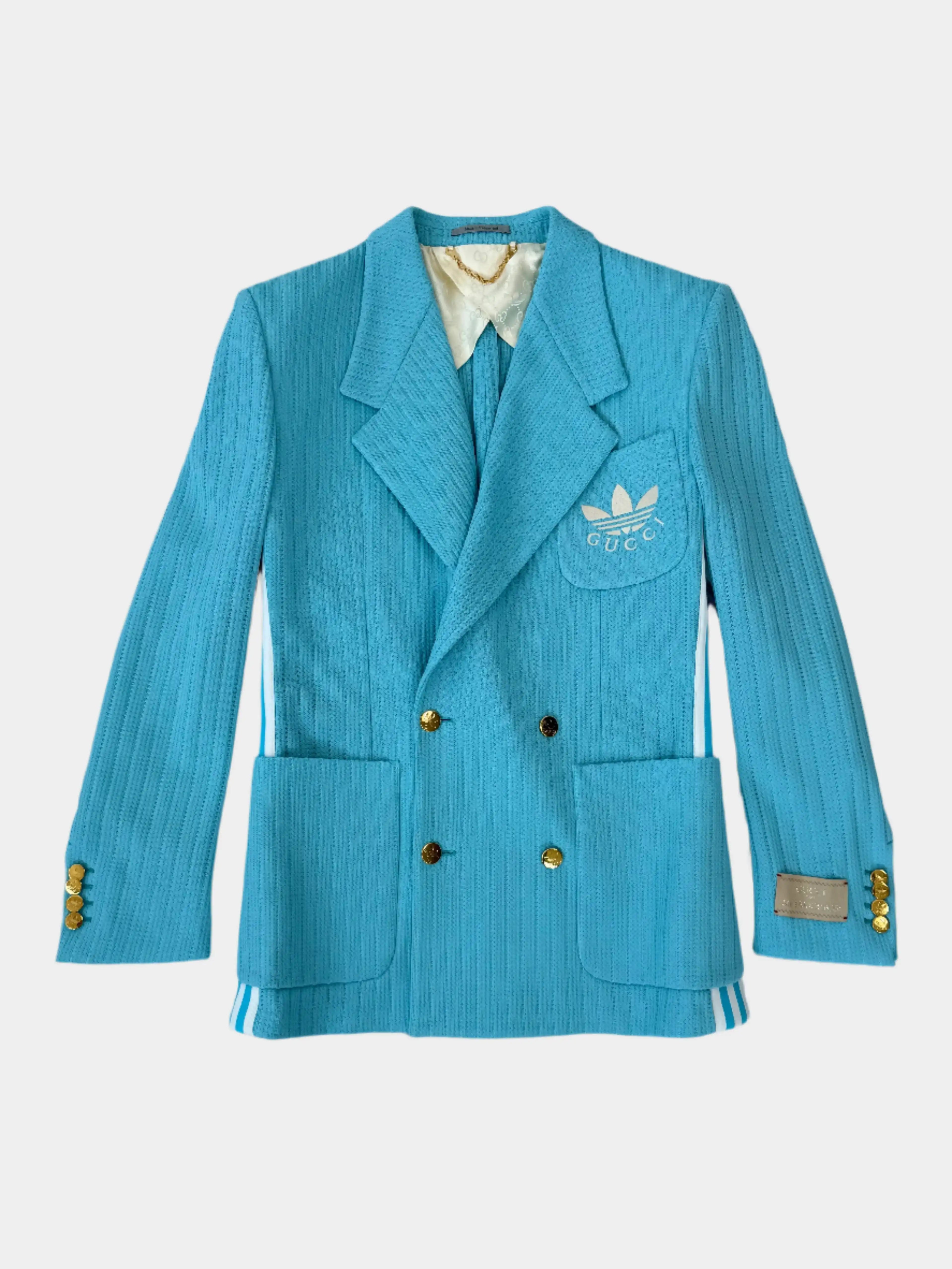 Blazer Gucci celeste con logo Adidas ricamato e tasche frontali