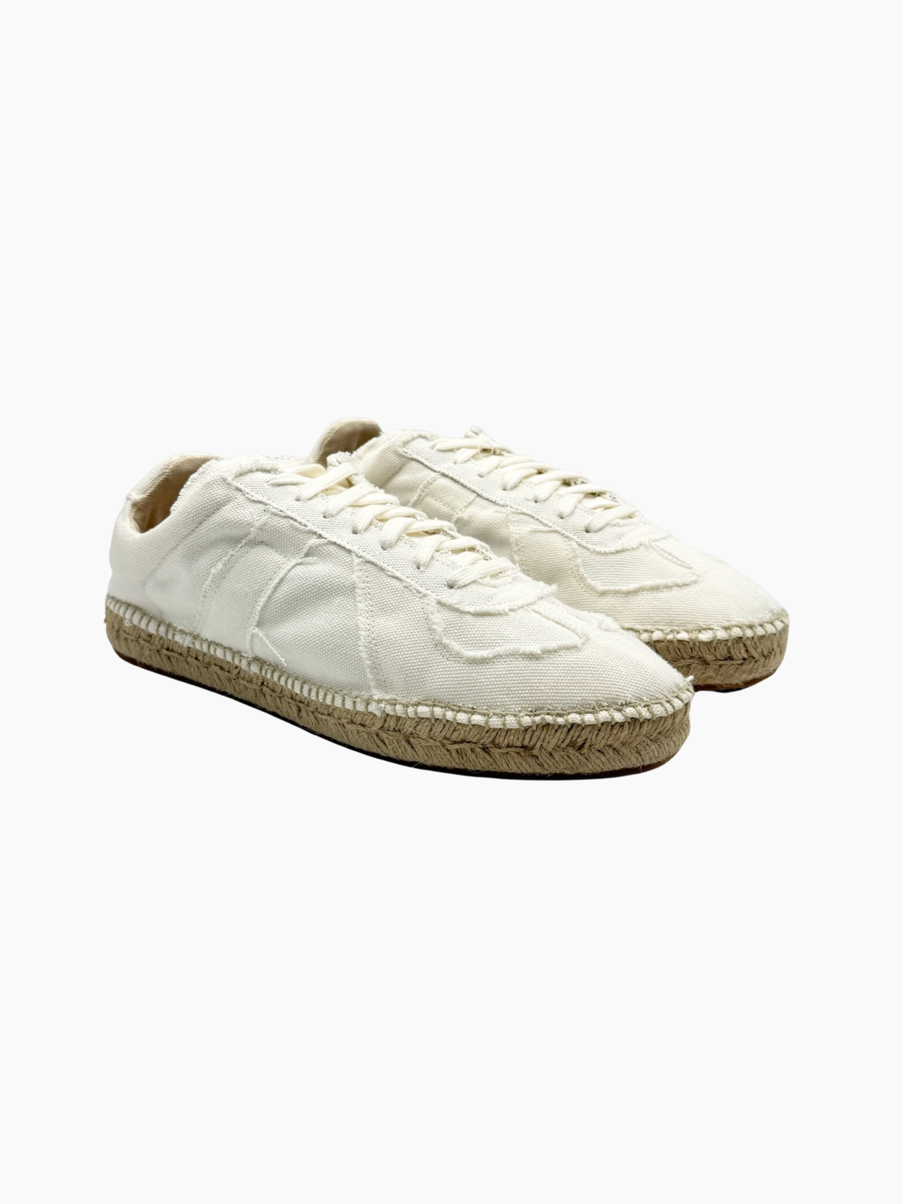 Sneakers Maison Margiela in tela bianca con suola in corda viste laterali