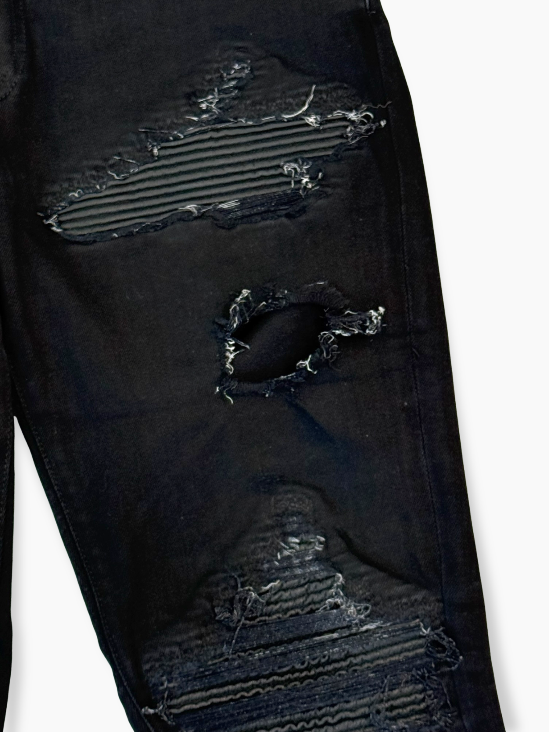 Jeans Neri Skinny Con Strappi