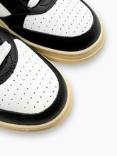 Sneakers Basket Bassa In Action Bianca Nera -  | Qlhype