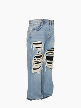 Jeans Azzurri Destroyed Con Strappi E Fondo Sfrangiato -  | Qlhype