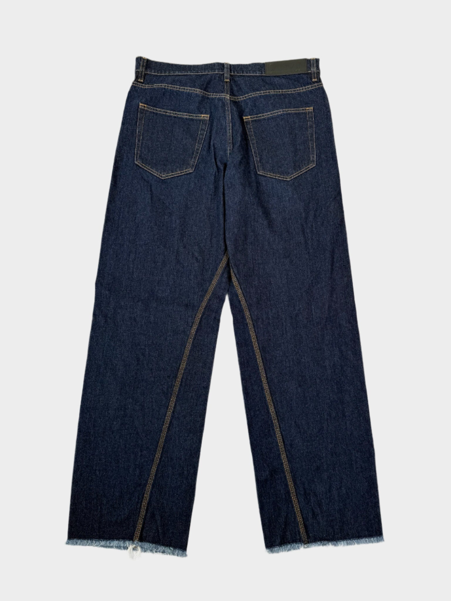 Pantaloni In Denim Blu Con Fondo Sfrangiato