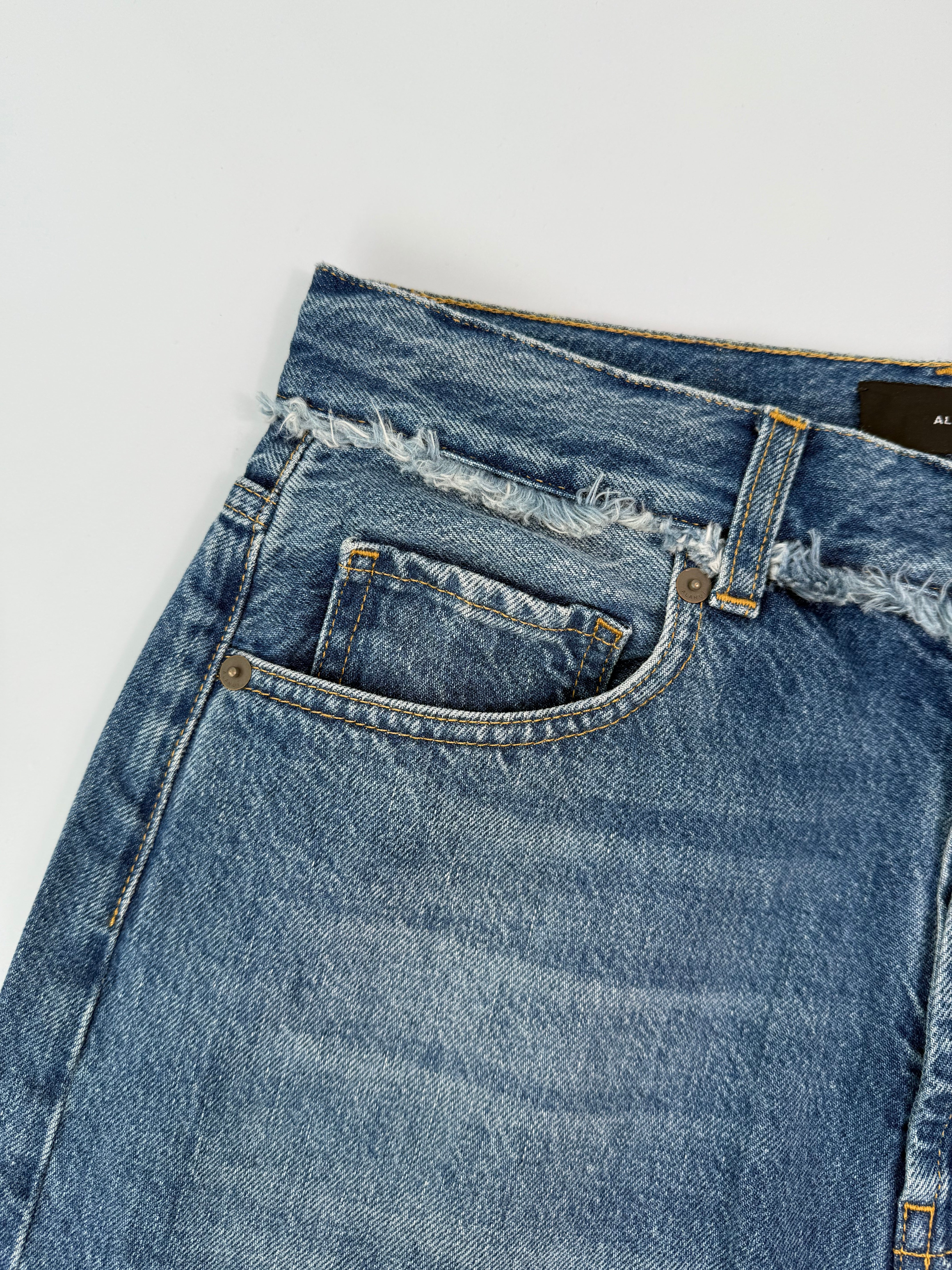 Relaxed Fit Blue Denim Trousers With Frayed Hem