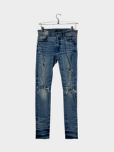 Ripped Jeans -  | dBlank