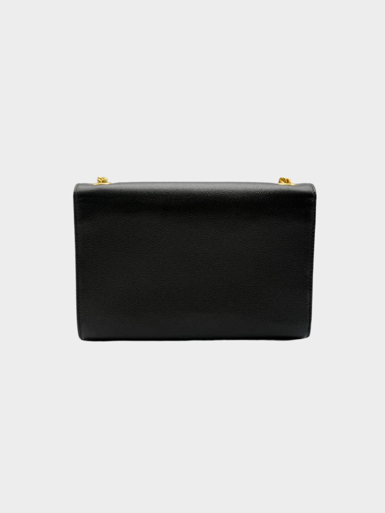 Black Bag With Shoulder Strap And Golden Tassel