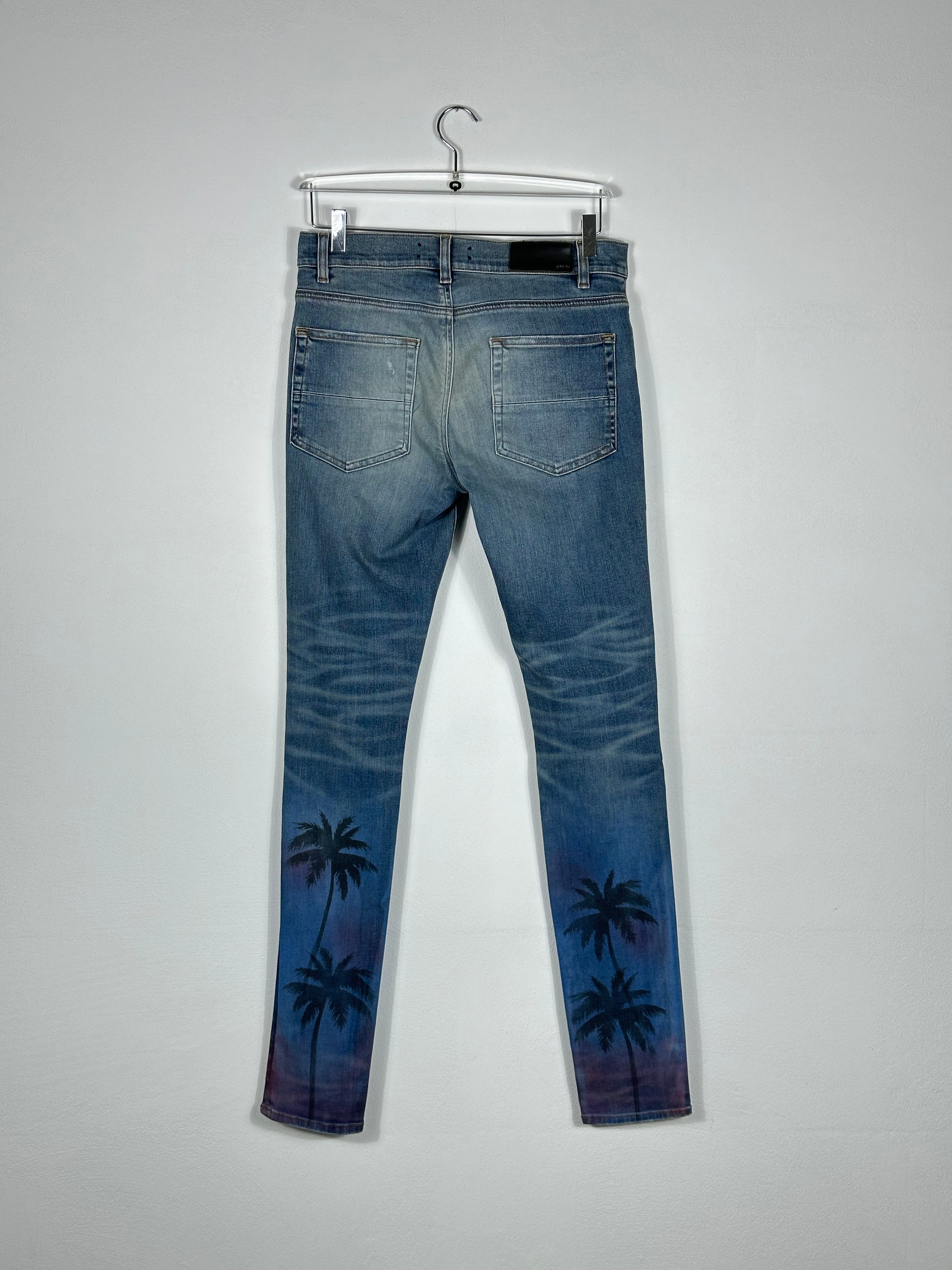 Ripped Jeans With Palms