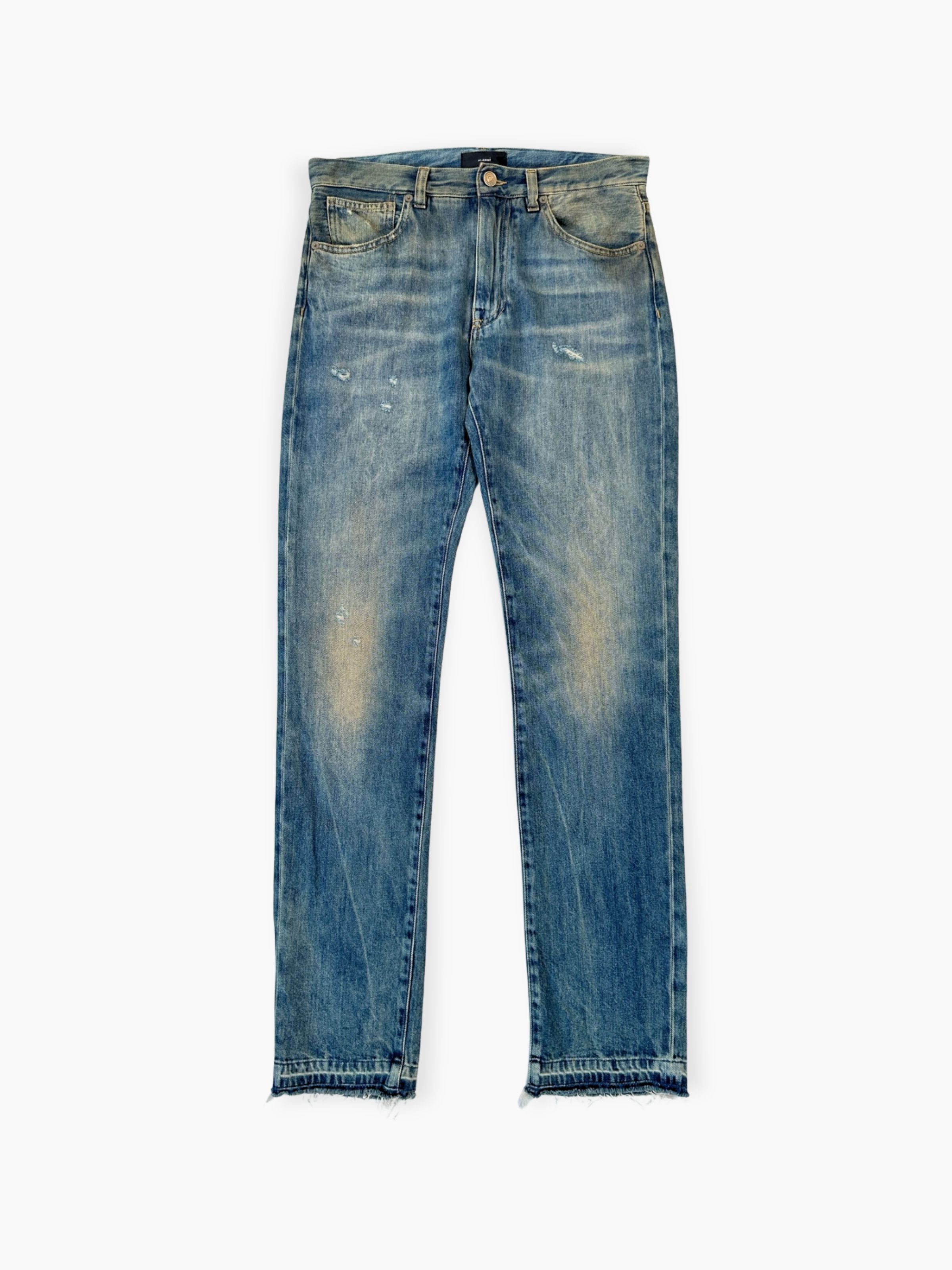 Jeans blu Alanui in denim con effetto usurato e orlo sfrangiato vista frontale