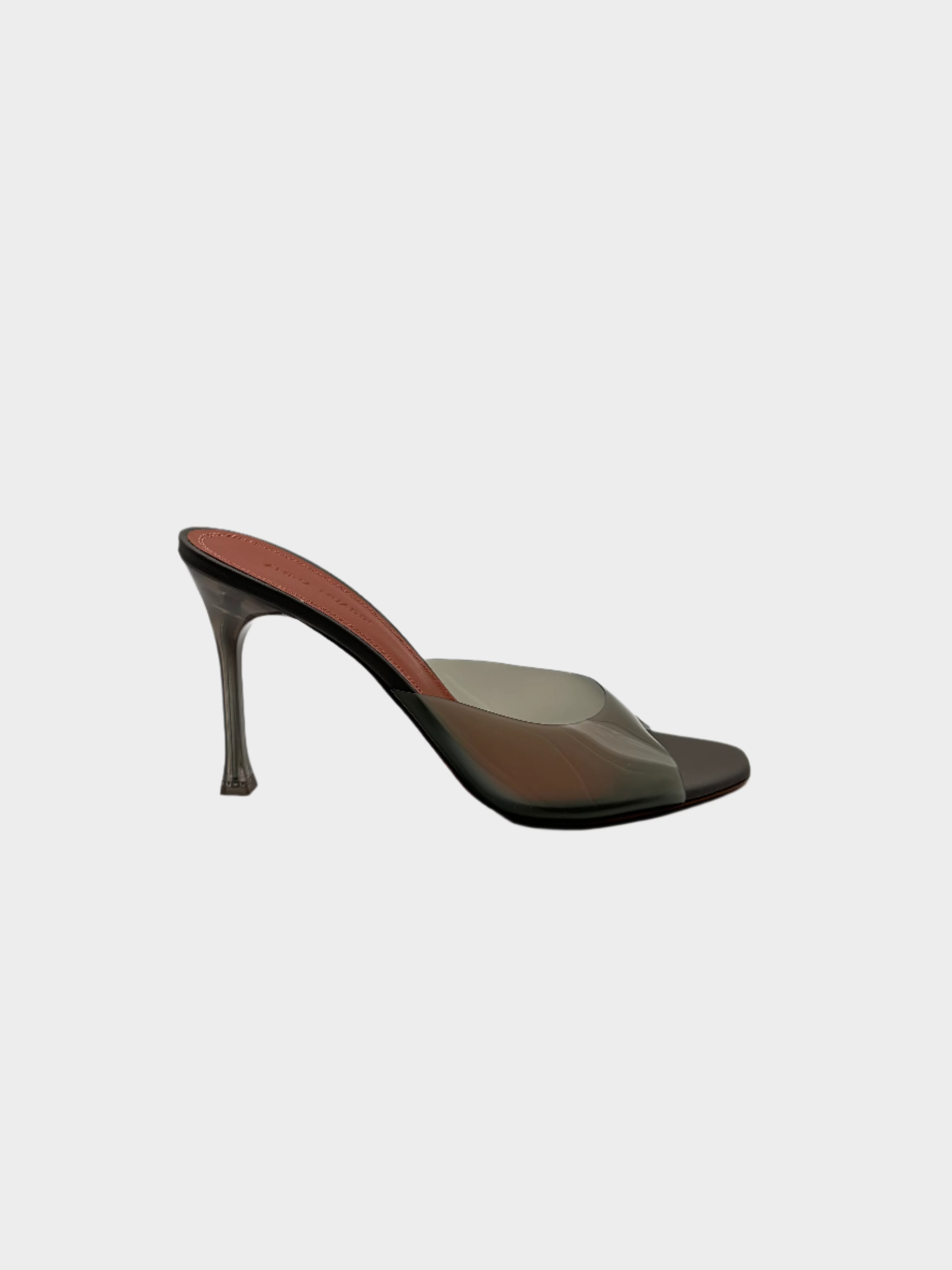 Alexa Glass Slipper open-toe in PVC trasparente con tacco stiletto in plexiglass da 9.5 cm.