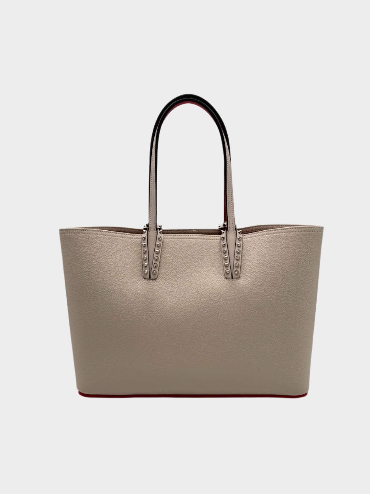 Borsa shopper Louboutin rosa in pelle martellata con borchie e interno rosso vista frontale small