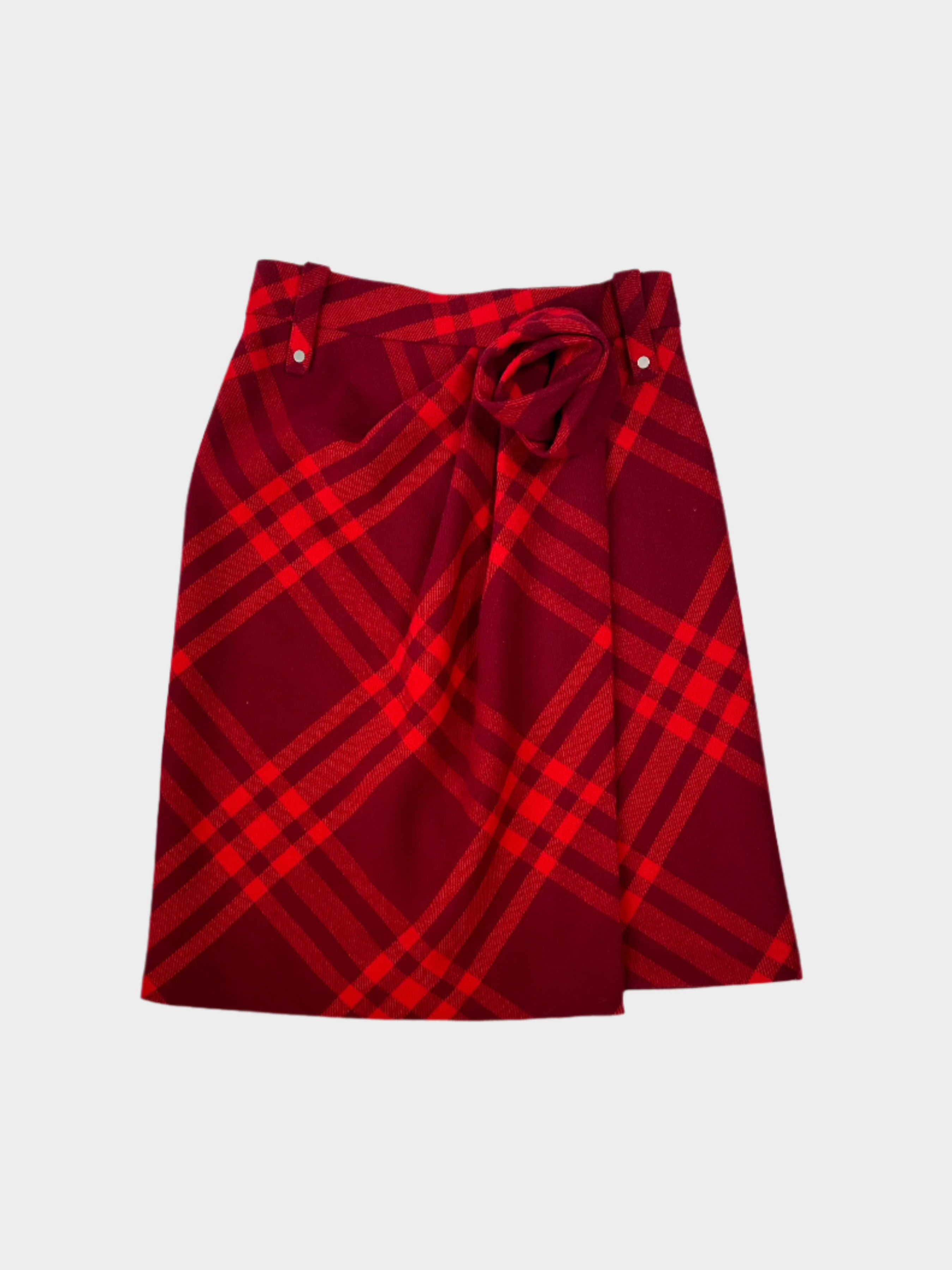 Vista frontale della gonna Burberry rossa con motivo check

