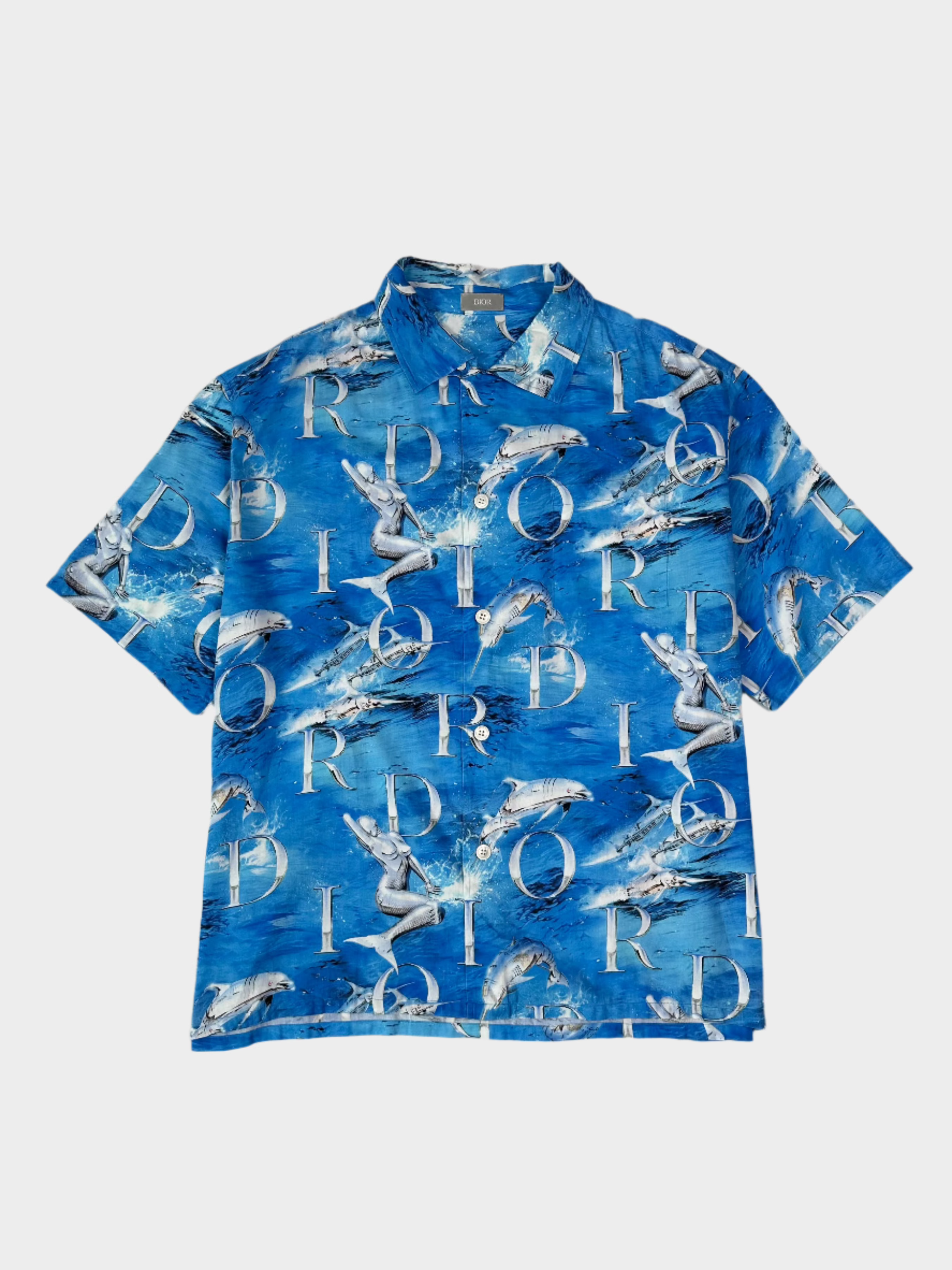 Camicia Dior blu a maniche corte con stampa delfini e logo all over