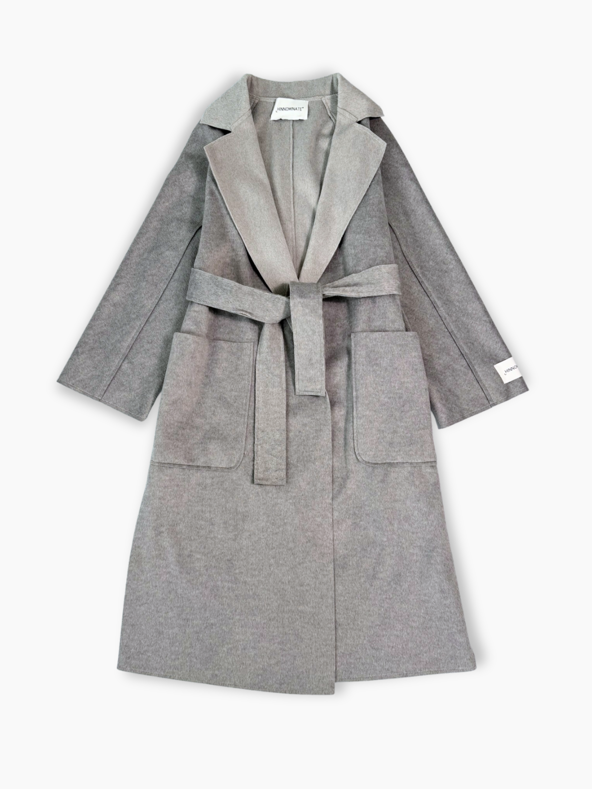 Cappotto grigio Hinnominate con cintura e revers a lancia vista frontale