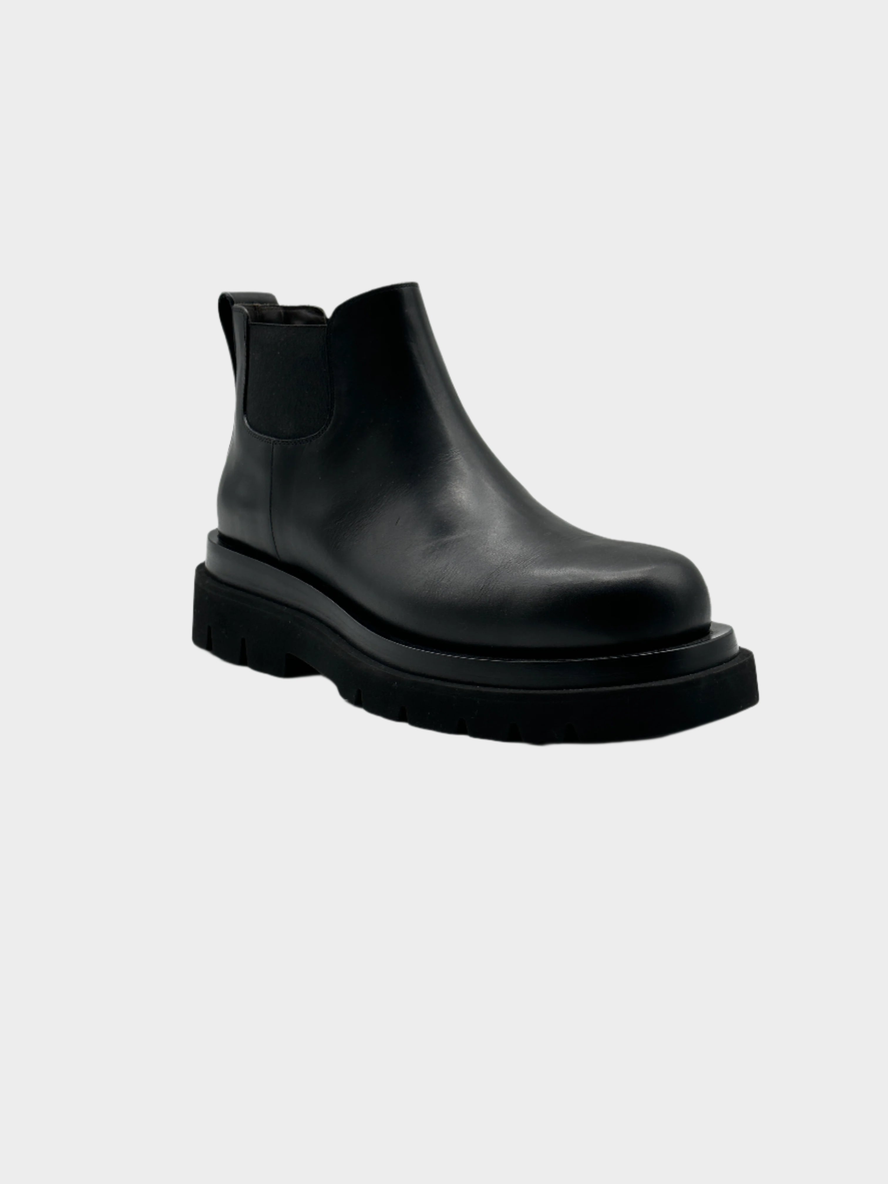 Chunky Ankle Boots con punta arrotondata, suola lug e elastico laterale. Comfort e stile urbano.