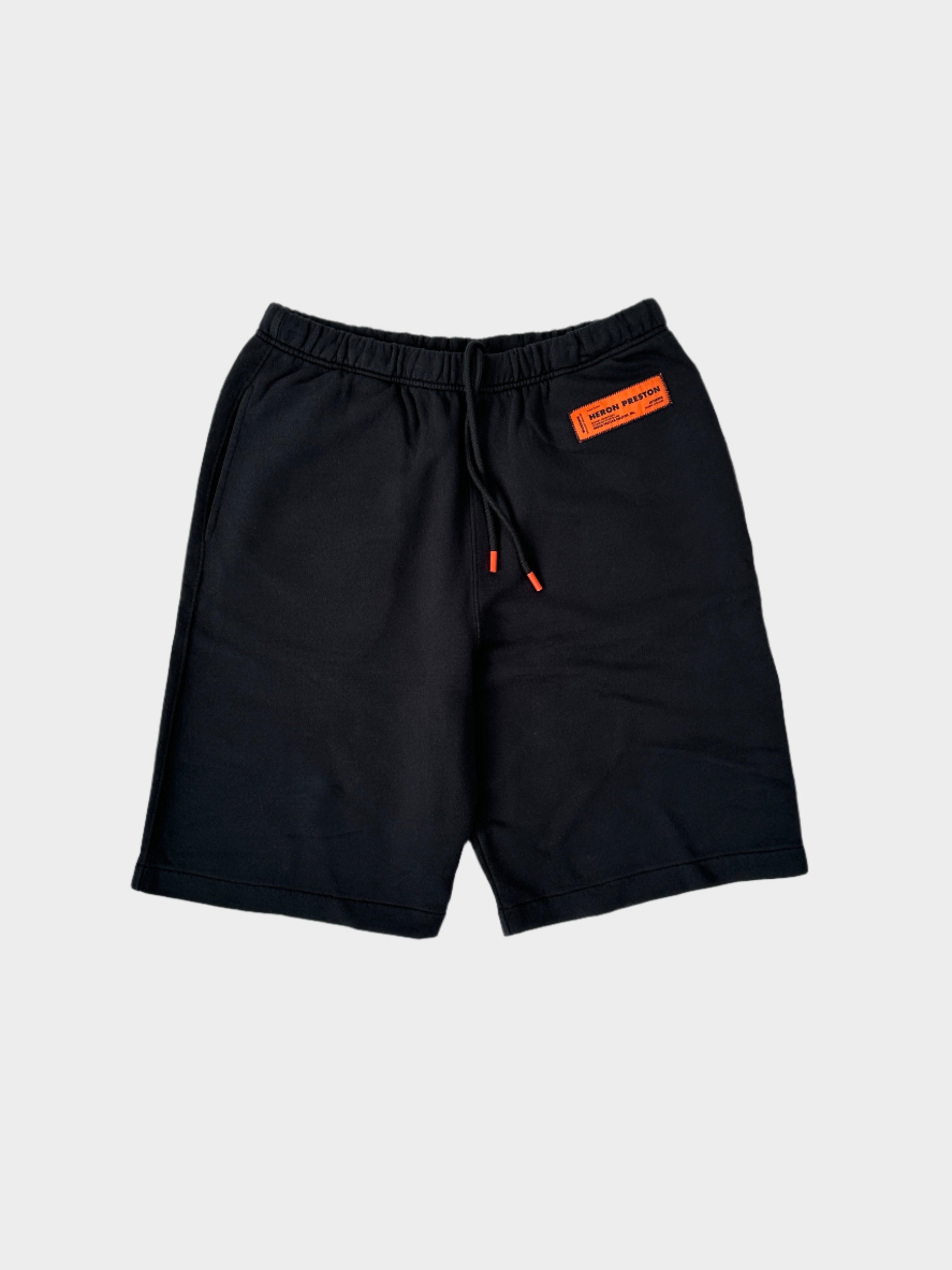 Pantaloncini Heron Preston in cotone nero con logo arancione sul davanti


