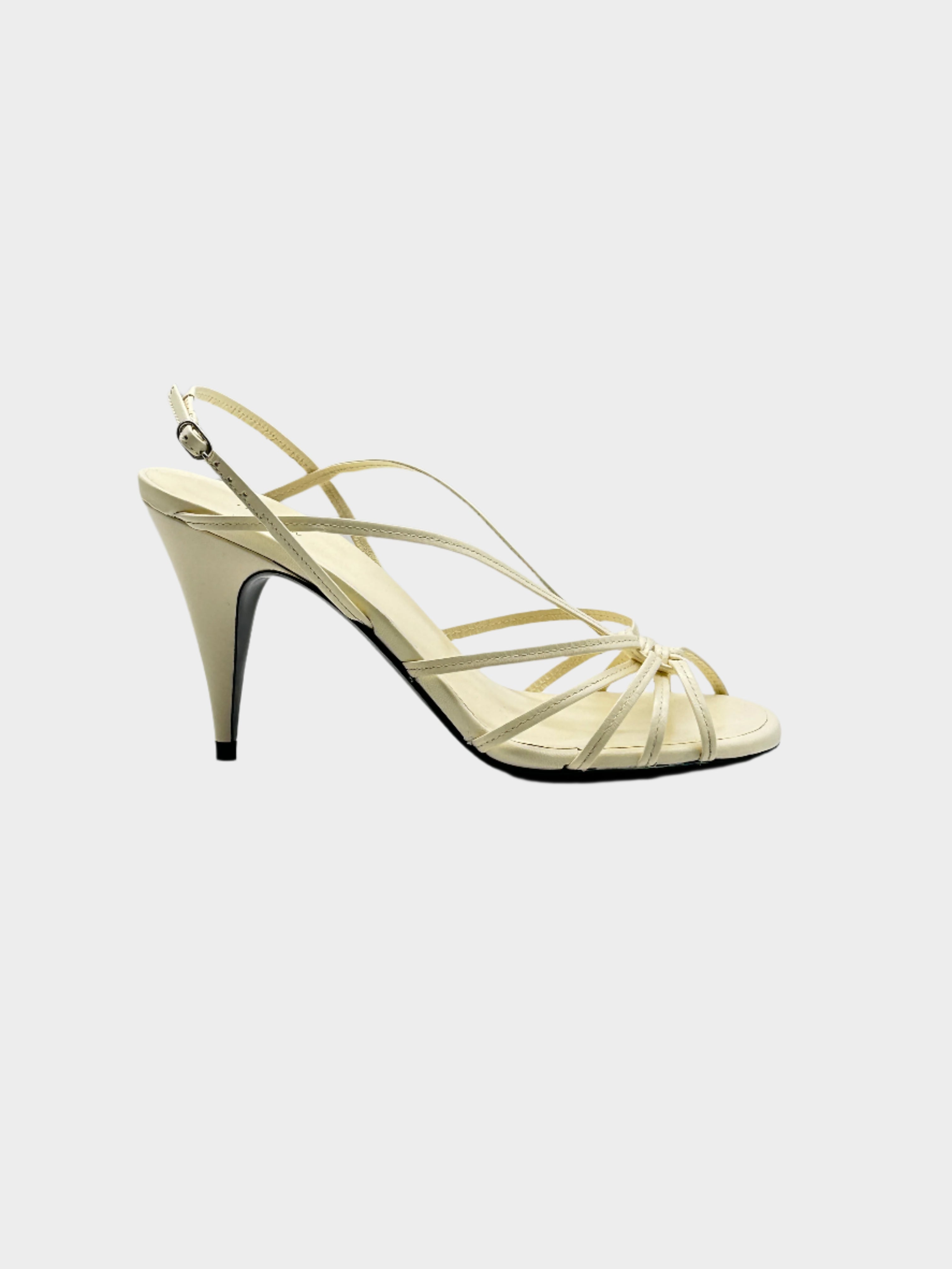 Ivory Heel Sandals in pelle con multi cinturini, nodo centrale e tacco 9 cm.