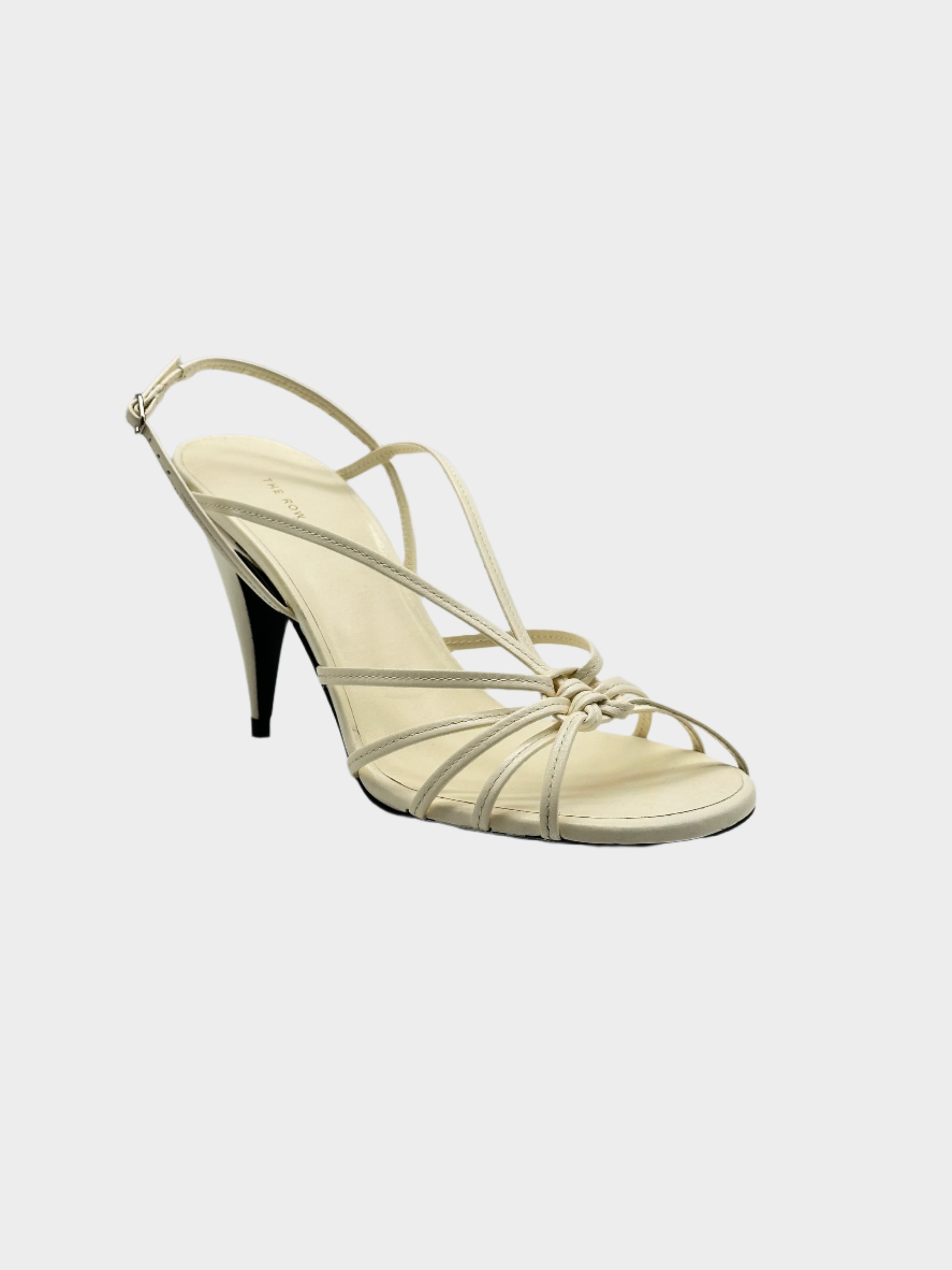 Ivory Heel Sandals in pelle con multi cinturini, nodo centrale e tacco 9 cm.