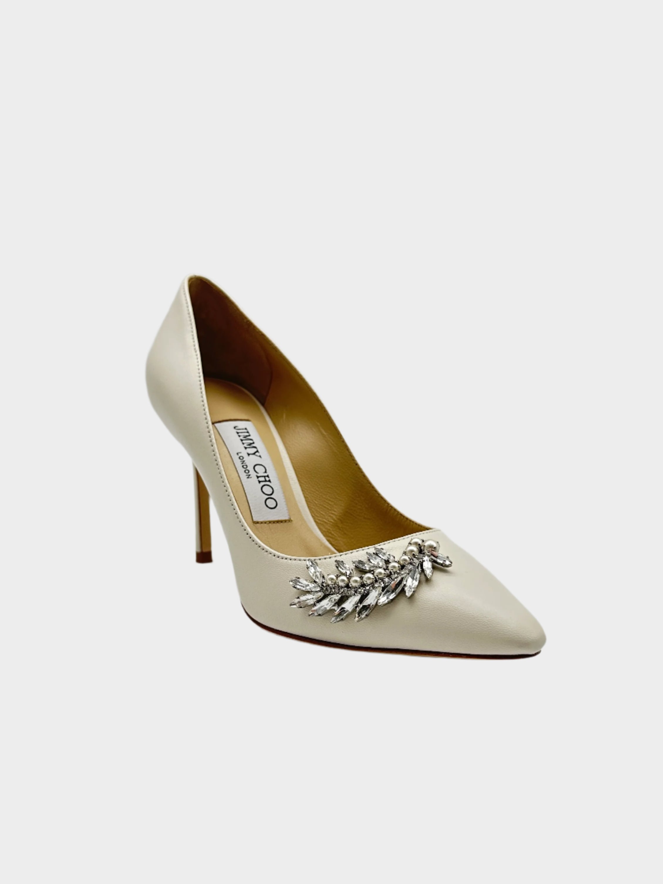 Leather Crystals Pumps con punta affusolata, buckle con cristalli, tacco a stiletto da 8,5 cm e suola in pelle.