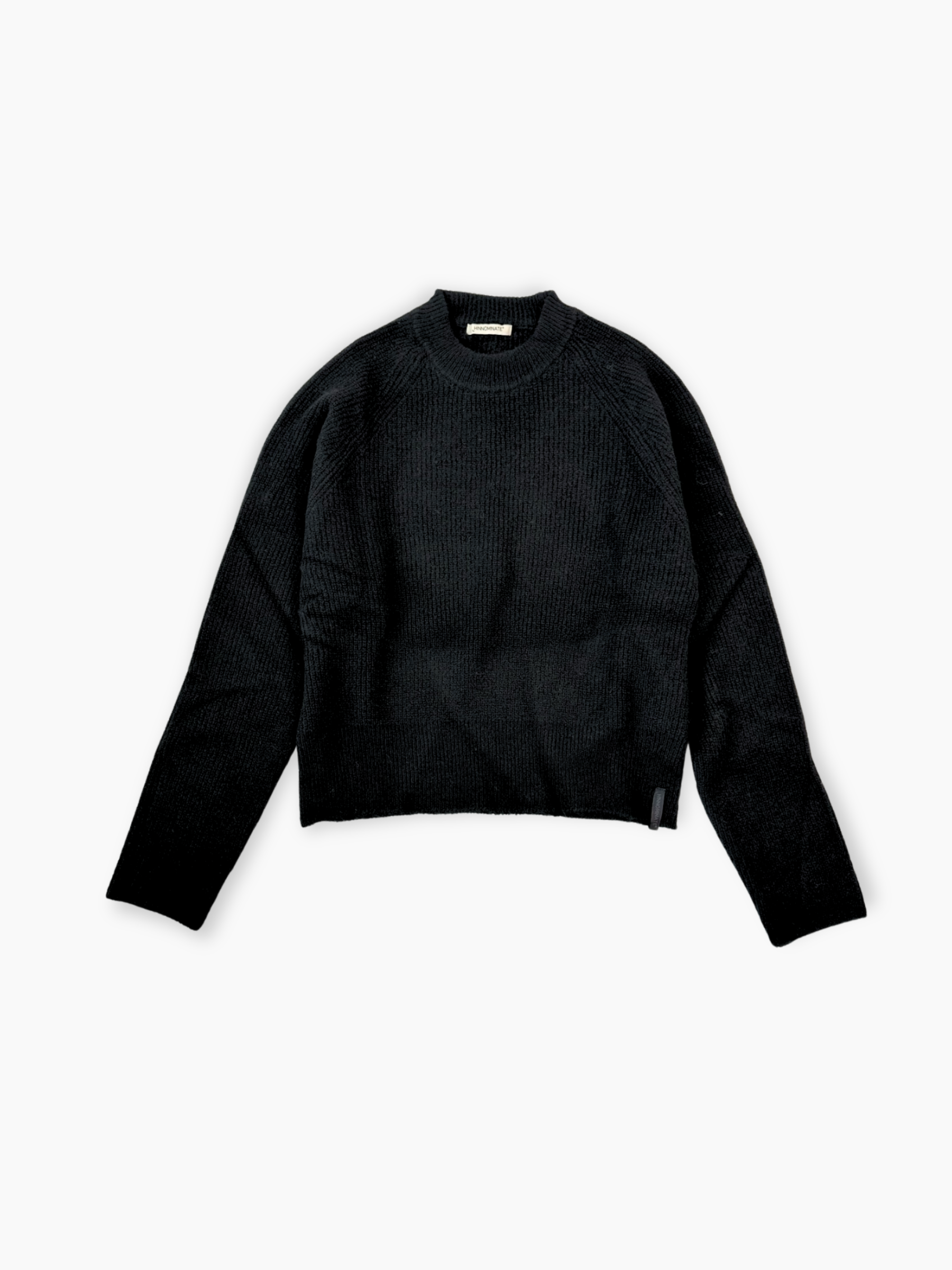 Maglione nero Hinnominate in maglia a costine con taglio cropped vista frontale