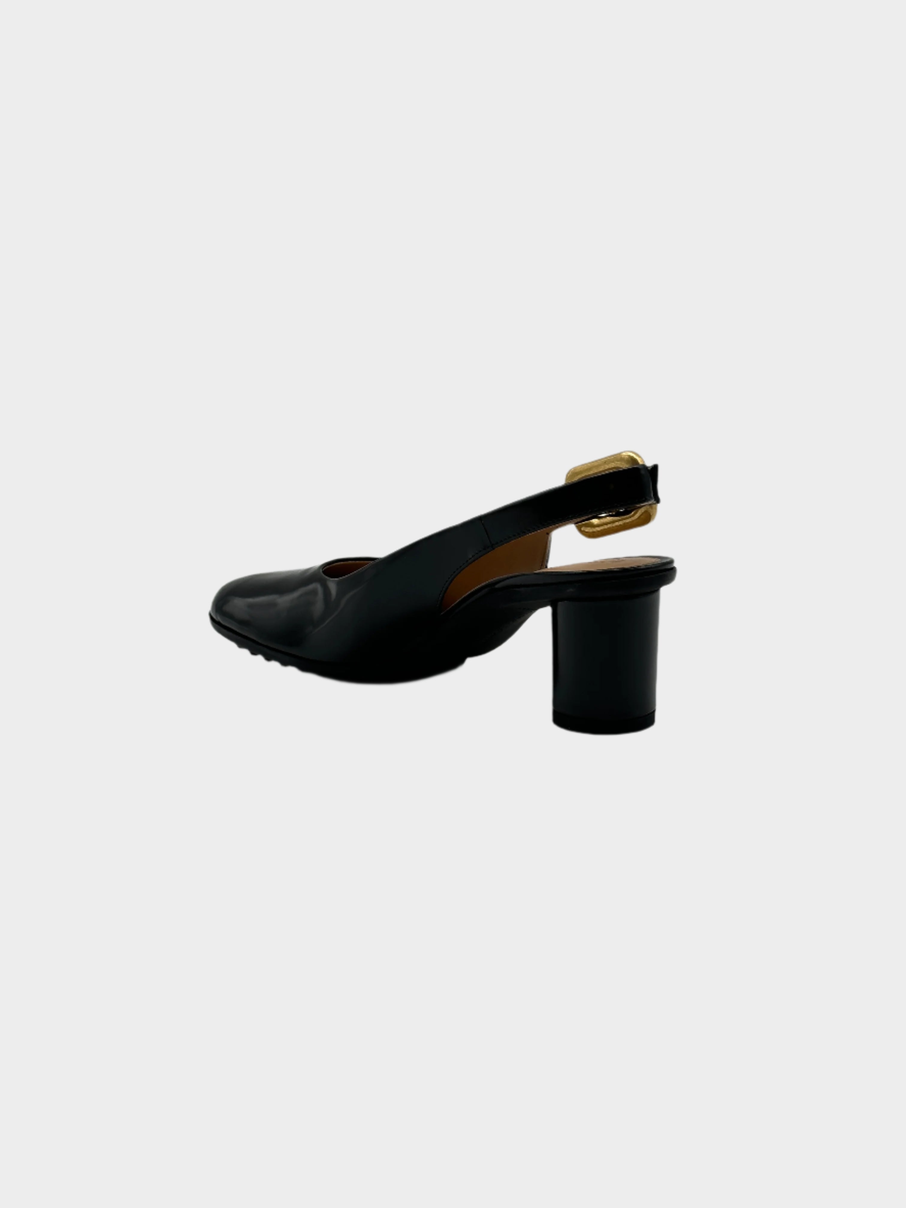 Mules With Heel con punta arrotondata, fibbia laterale e tacco arrotondato. Design elegante e moderno.