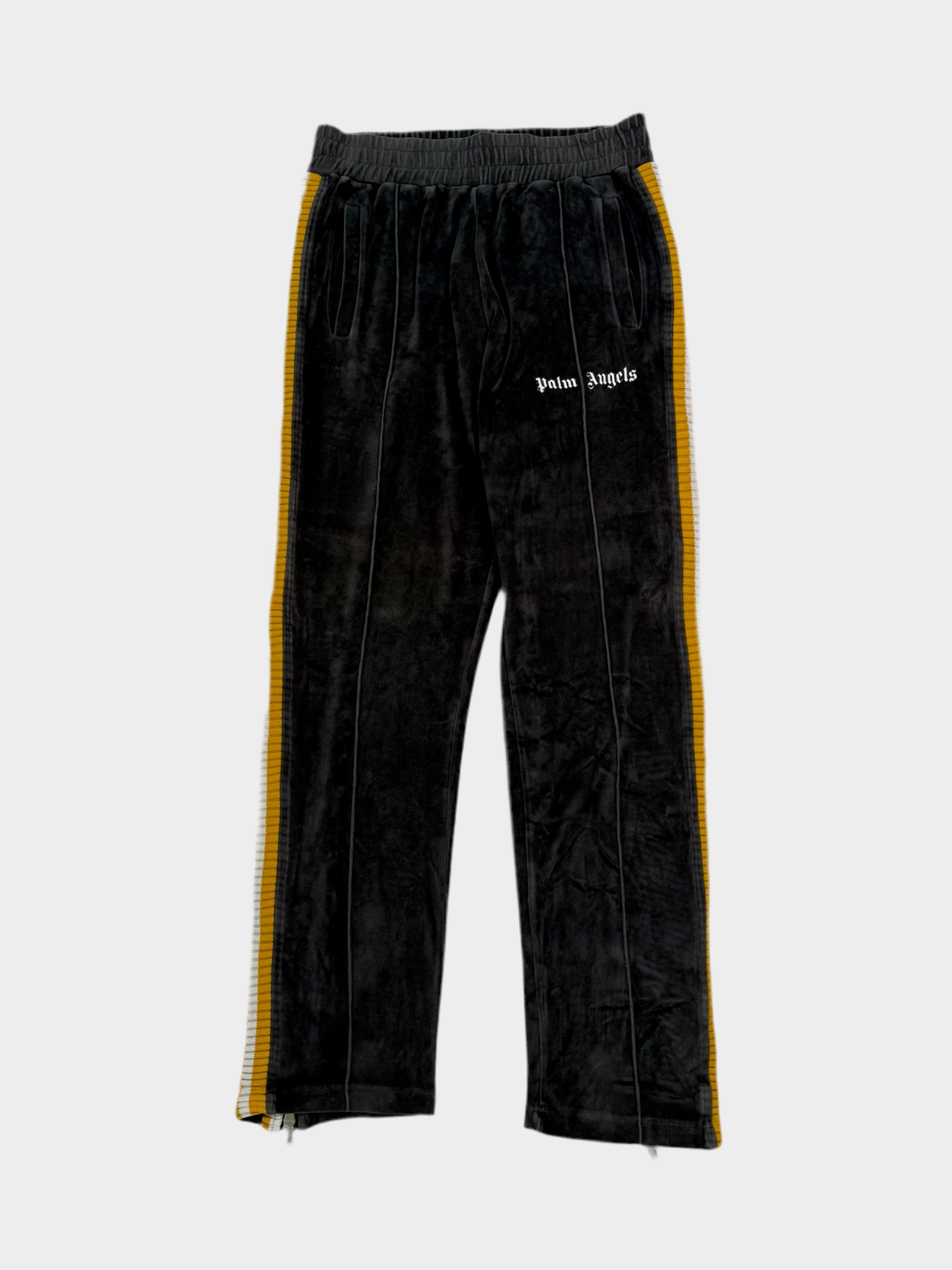 Vista frontale del pantalone Palm Angels effetto velluto grigio con bande laterali