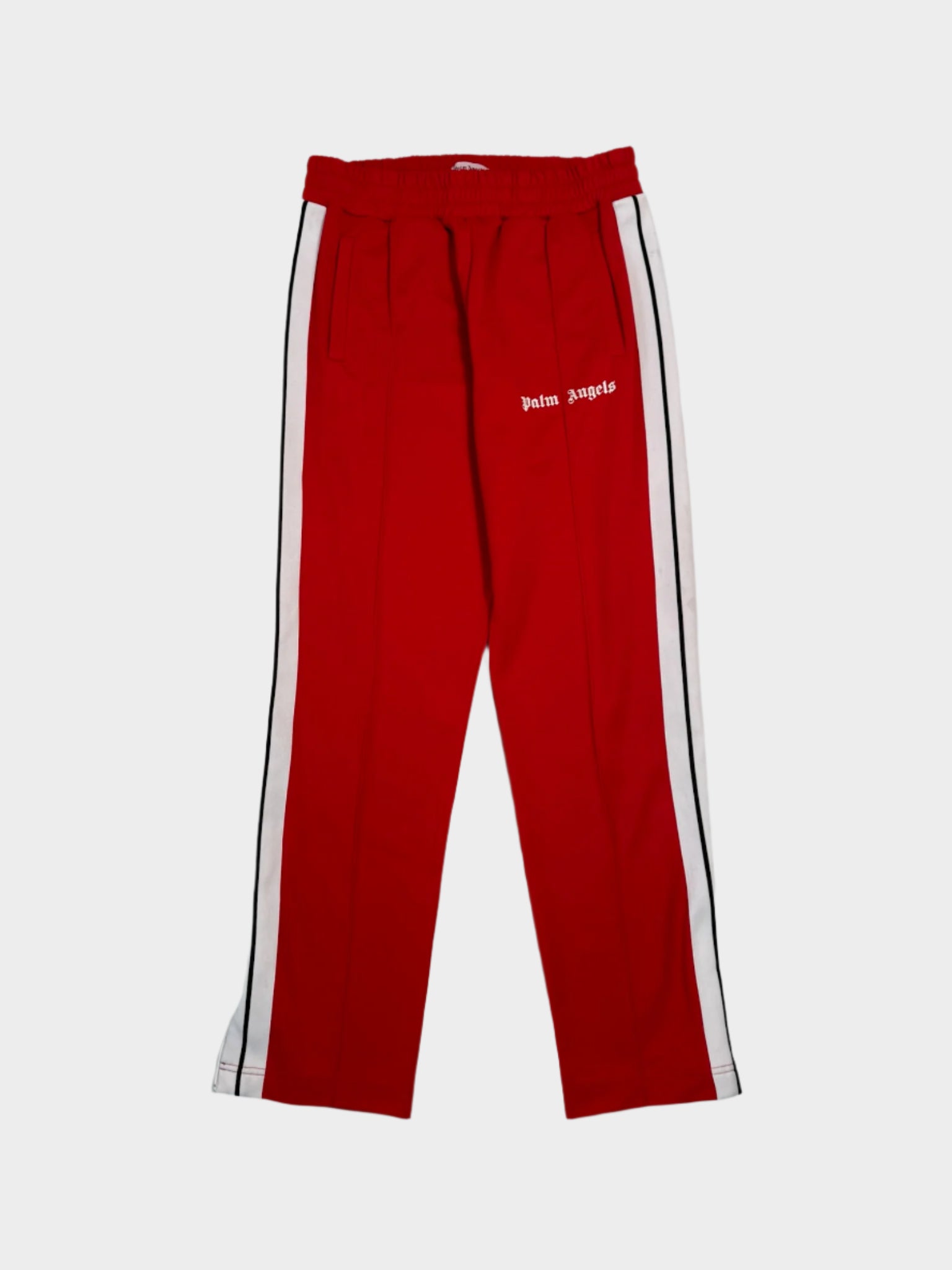 Vista frontale dei pantaloni Palm Angels rossi con bande laterali