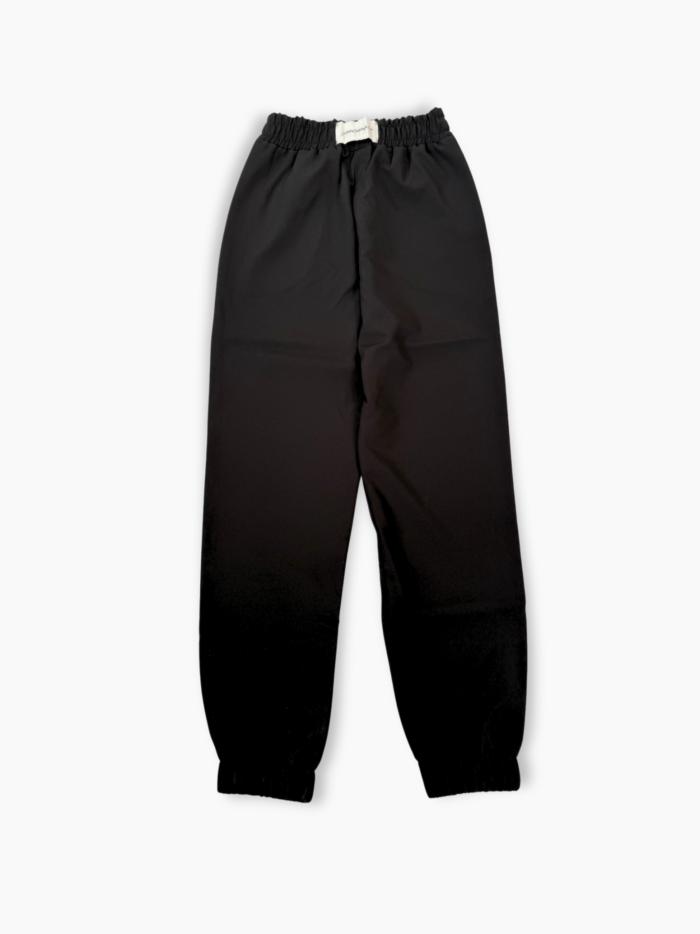 Pantalone lungo nero in tessuto tecnico con elastico in vita e al fondo