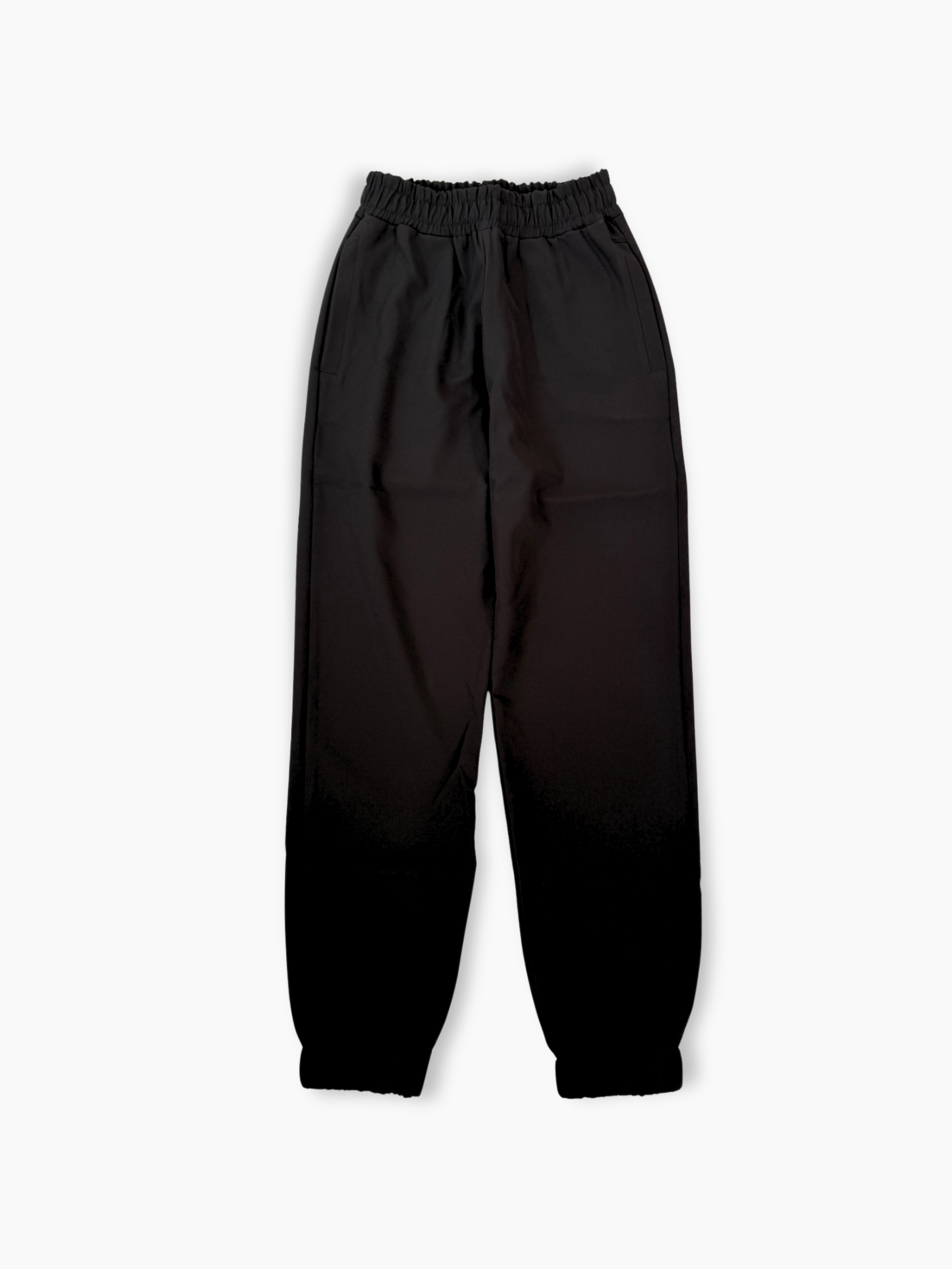 Pantalone lungo nero in tessuto tecnico con elastico in vita e al fondo