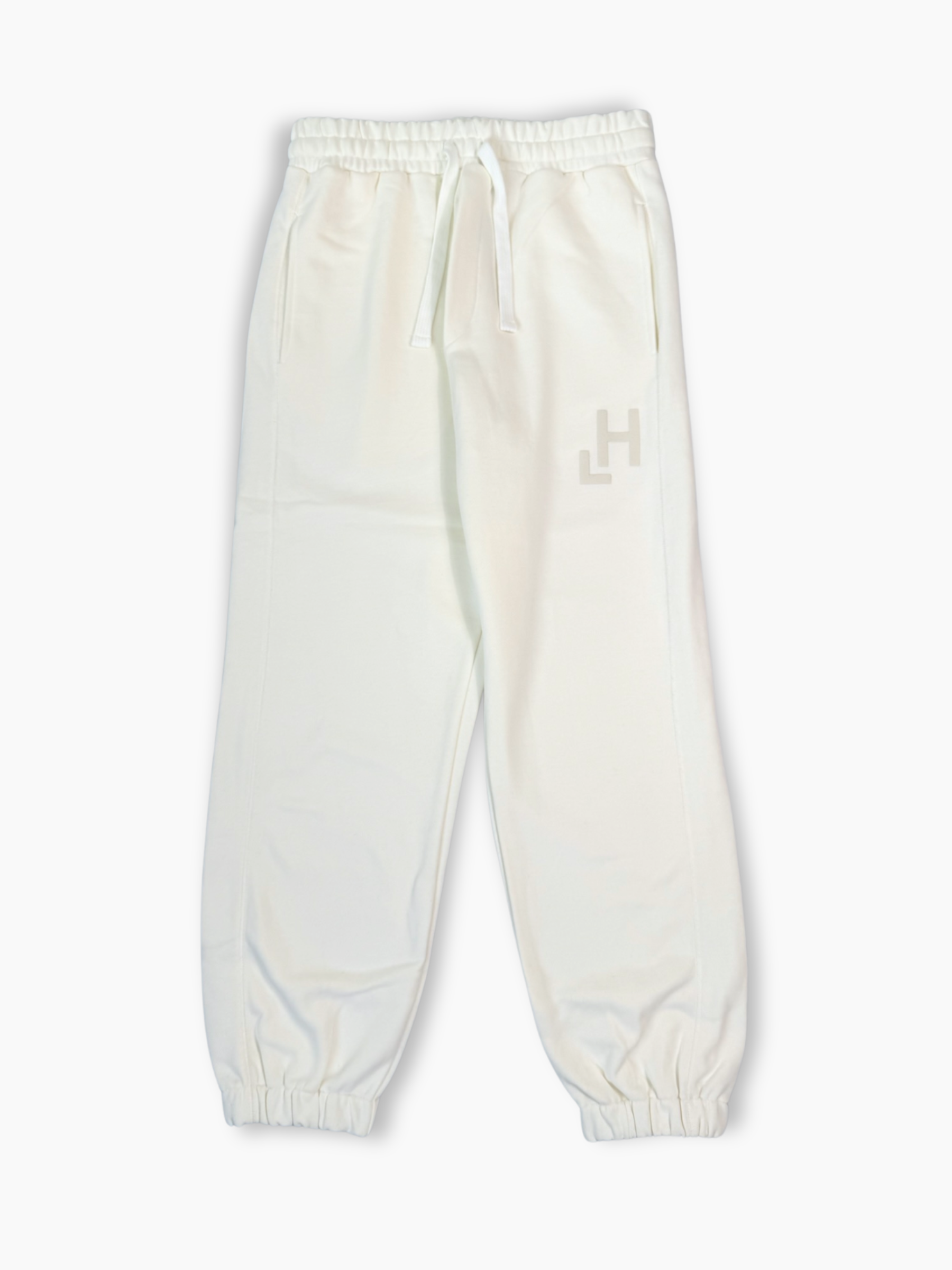 Pantaloni jogger bianchi con logo e coulisse vista frontale