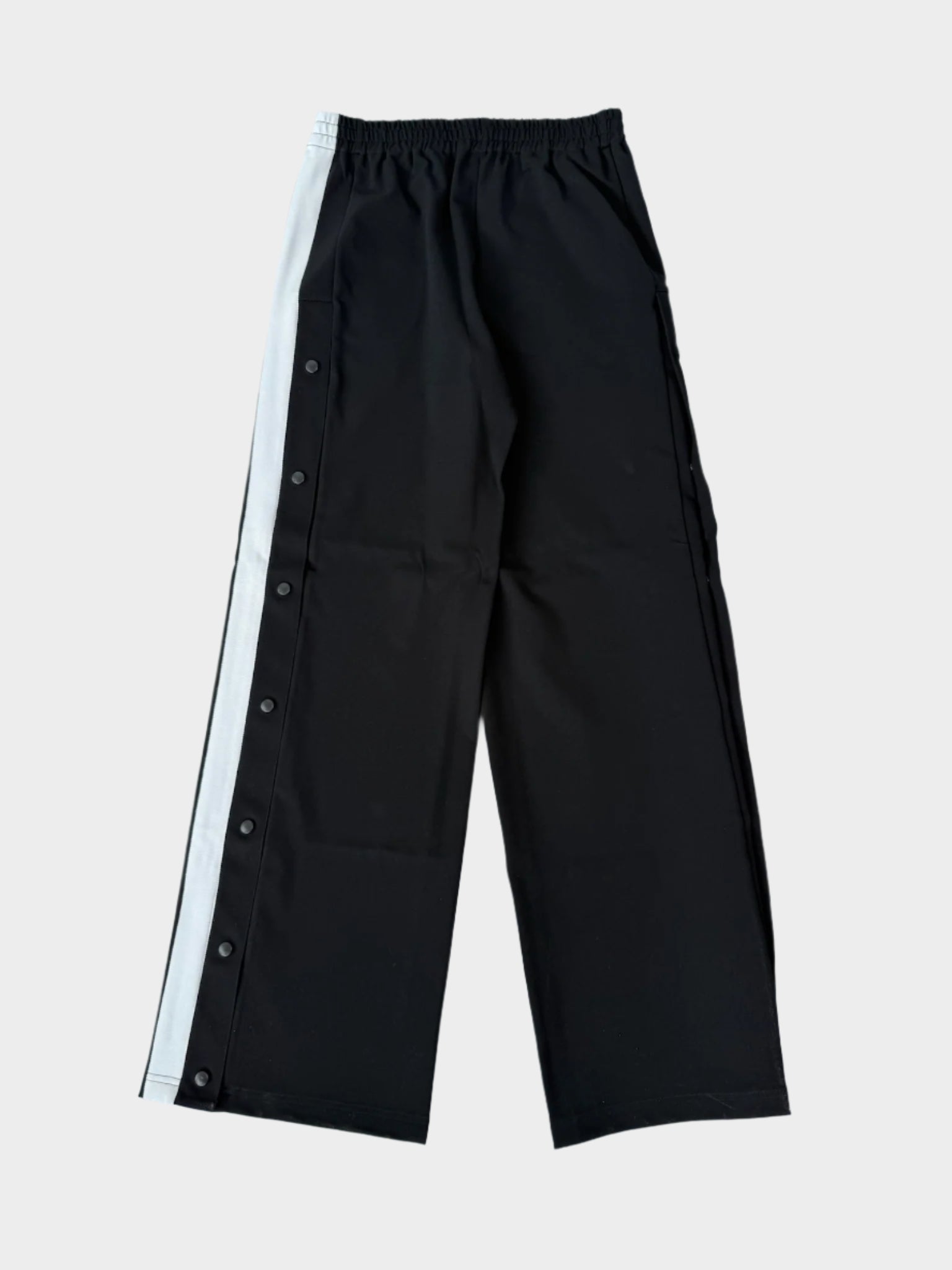 Pantaloni Neri In Jersey Con Bottoni Laterali
