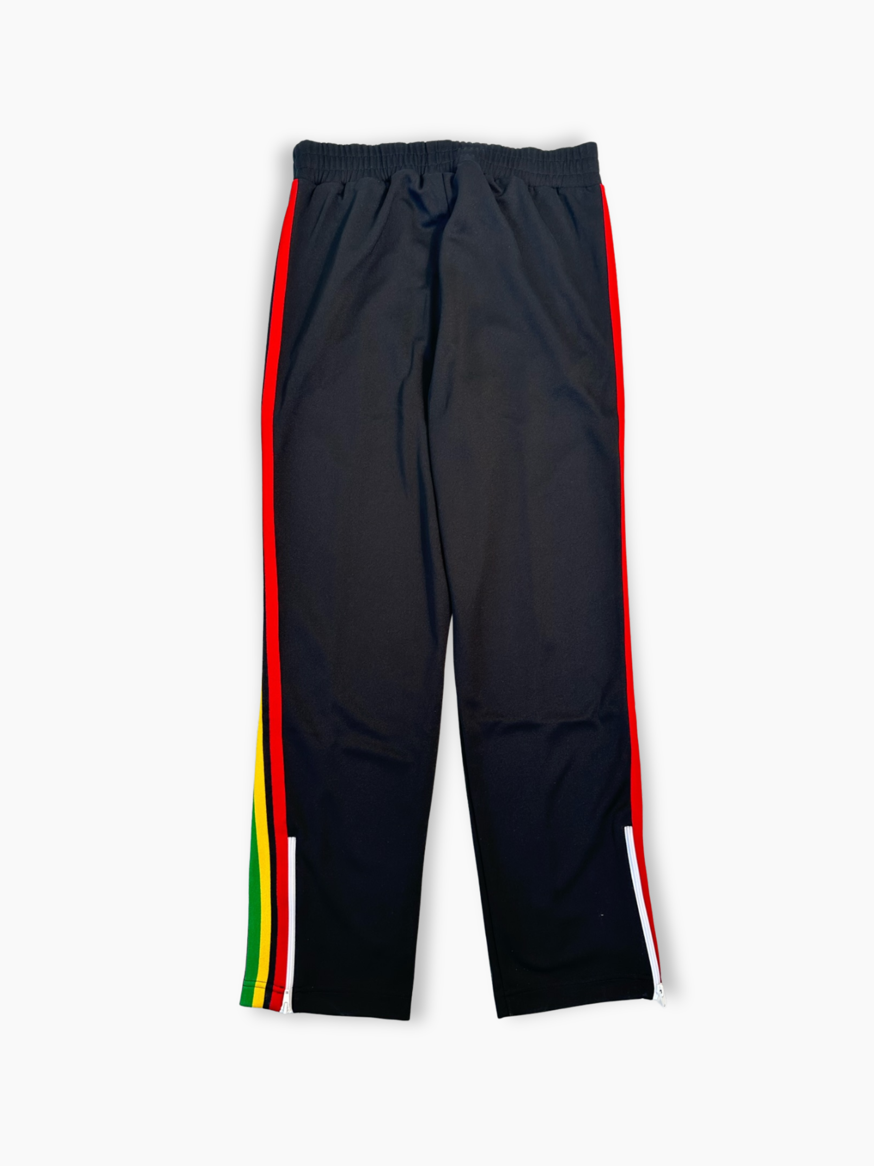 Dettaglio bande laterali e zip al fondo dei pantaloni Palm Angels